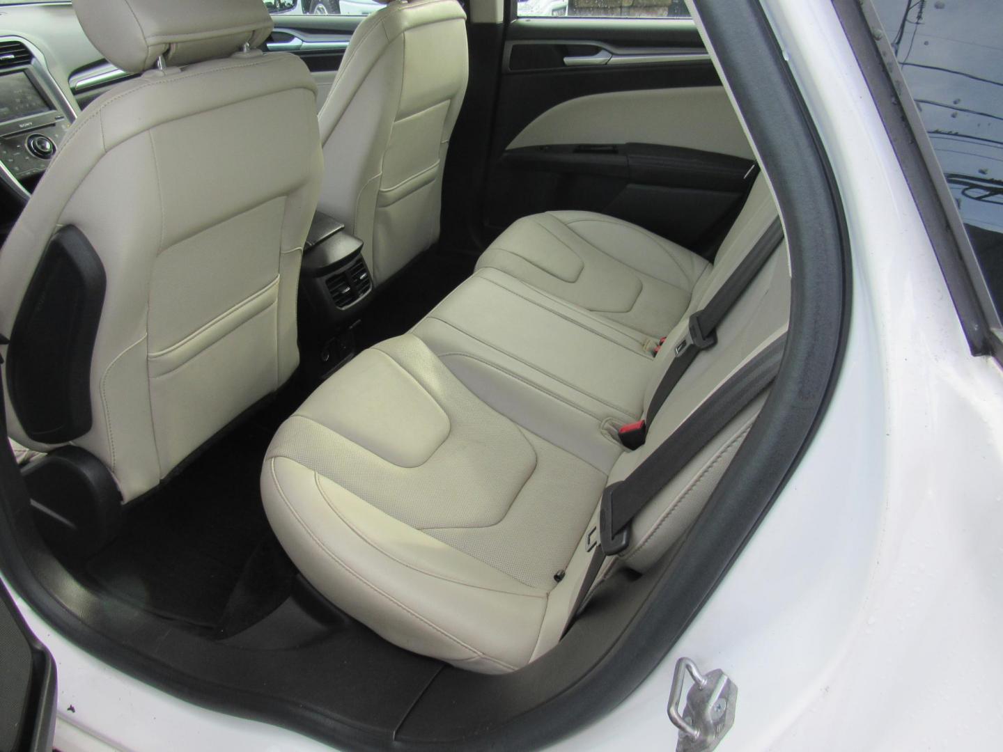 2015 White /Gray Ford Fusion Titanium (3FA6P0K98FR) with an 2.0L L4 DOHC 16V engine, Automatic transmission, located at 215 Milton St, Dedham, MA, 02026, (781) 329-5144, 42.241905, -71.157295 - This nice little sedan runs great. Loaded up Titanium. All ASPI Motor Cars vehicles are fully serviced before they are delivered to assure the highest quality used vehicle. Call for details Prices on all vehicles do not include $299.95 Documentation fee, as well as Massachusetts sales tax, Regist - Photo#13