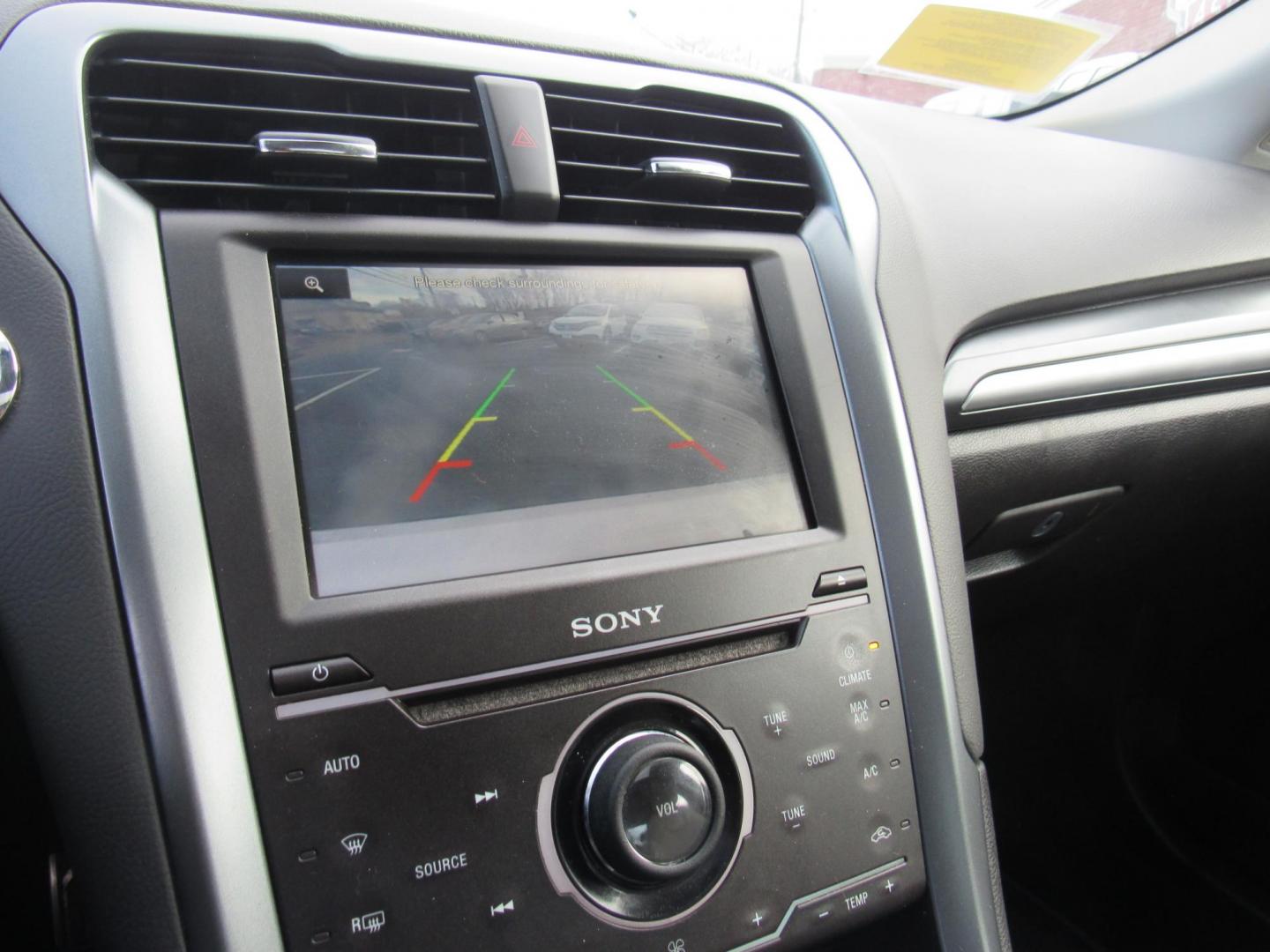 2015 White /Gray Ford Fusion Titanium (3FA6P0K98FR) with an 2.0L L4 DOHC 16V engine, Automatic transmission, located at 215 Milton St, Dedham, MA, 02026, (781) 329-5144, 42.241905, -71.157295 - This nice little sedan runs great. Loaded up Titanium. All ASPI Motor Cars vehicles are fully serviced before they are delivered to assure the highest quality used vehicle. Call for details Prices on all vehicles do not include $299.95 Documentation fee, as well as Massachusetts sales tax, Regist - Photo#20