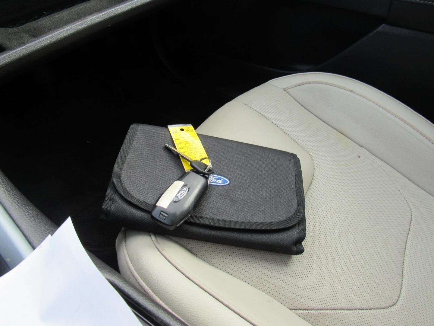 2015 White /Gray Ford Fusion Titanium (3FA6P0K98FR) with an 2.0L L4 DOHC 16V engine, Automatic transmission, located at 215 Milton St, Dedham, MA, 02026, (781) 329-5144, 42.241905, -71.157295 - This nice little sedan runs great. Loaded up Titanium. All ASPI Motor Cars vehicles are fully serviced before they are delivered to assure the highest quality used vehicle. Call for details Prices on all vehicles do not include $299.95 Documentation fee, as well as Massachusetts sales tax, Regist - Photo#22