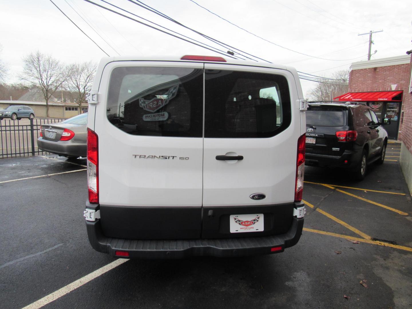 2016 White /Gray Ford Transit 150 Wagon Low Roof XLT 60/40 Pass. 130-in. WB (1FDZK1ZM3GK) with an 3.7L V6 DOHC 24V engine, 6A Automatic transmission, located at 215 Milton St, Dedham, MA, 02026, (781) 329-5144, 42.241905, -71.157295 - Photo#5