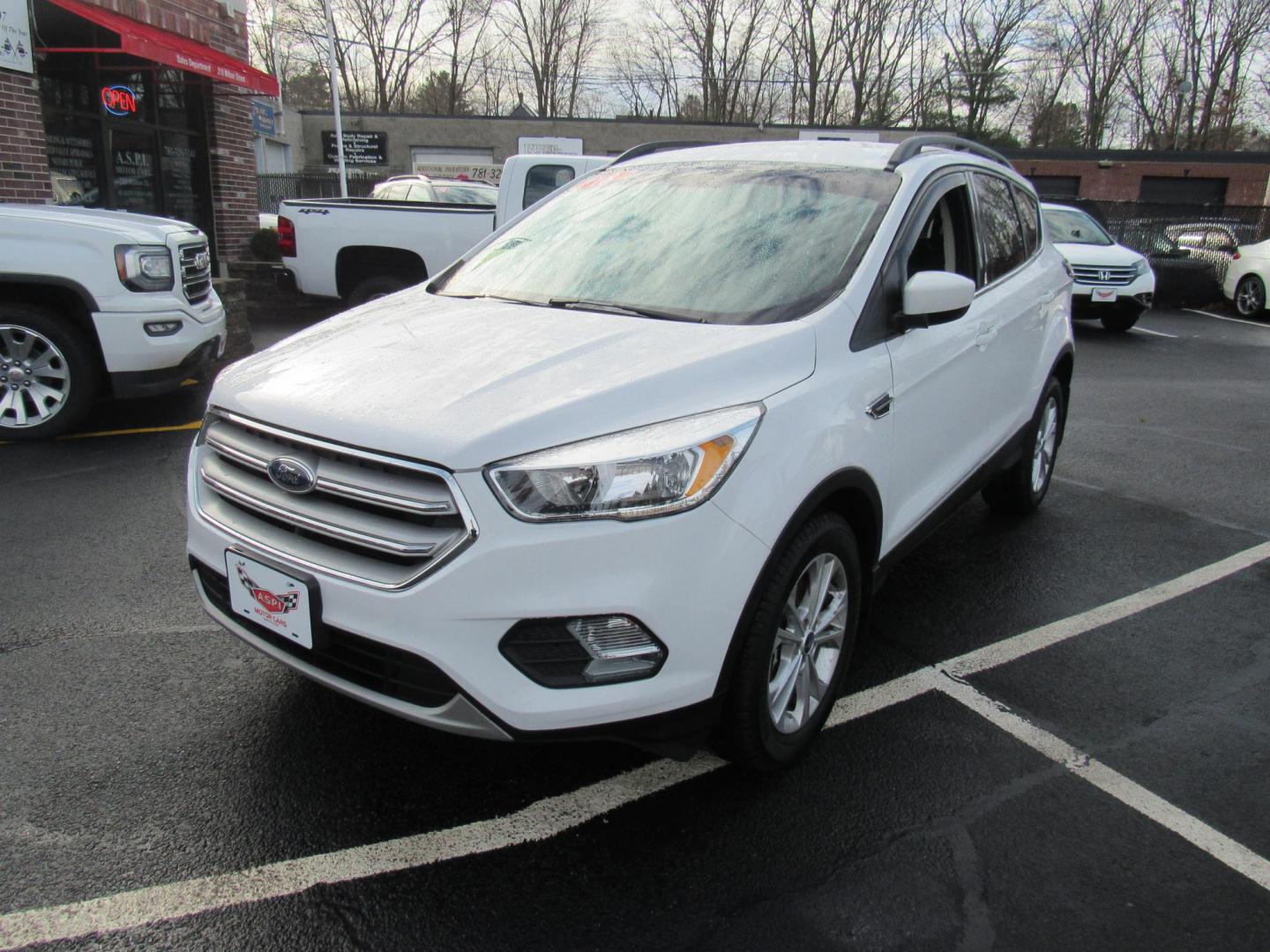 2018 White /Gray Ford Escape SE 4WD (1FMCU9GD5JU) with an 1.5L L4 DOHC 16V engine, 6A transmission, located at 215 Milton St, Dedham, MA, 02026, (781) 329-5144, 42.241905, -71.157295 - This nice little SUV is in excellent condition. Runs like new. All ASPI Motor Cars vehicles are fully serviced before they are delivered to assure the highest quality used vehicle. Call for details Prices on all vehicles do not include $299.95 Documentation fee, as well as Massachusetts sales ta - Photo#2