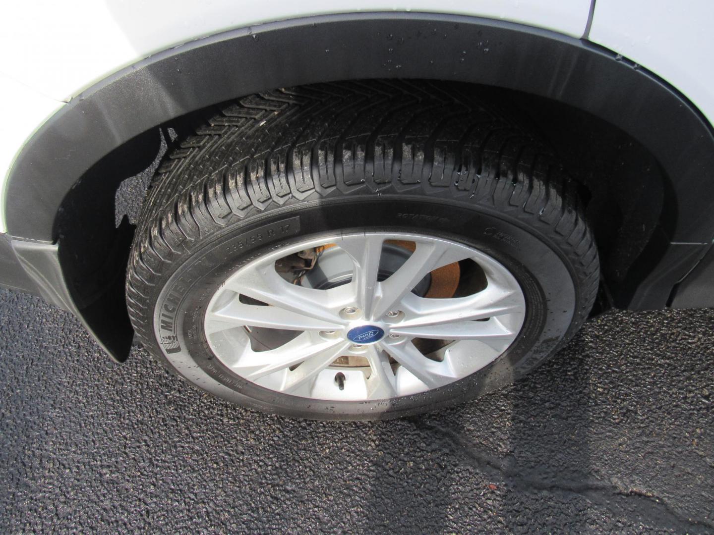 2018 White /Gray Ford Escape SE 4WD (1FMCU9GD5JU) with an 1.5L L4 DOHC 16V engine, 6A transmission, located at 215 Milton St, Dedham, MA, 02026, (781) 329-5144, 42.241905, -71.157295 - This nice little SUV is in excellent condition. Runs like new. All ASPI Motor Cars vehicles are fully serviced before they are delivered to assure the highest quality used vehicle. Call for details Prices on all vehicles do not include $299.95 Documentation fee, as well as Massachusetts sales ta - Photo#8