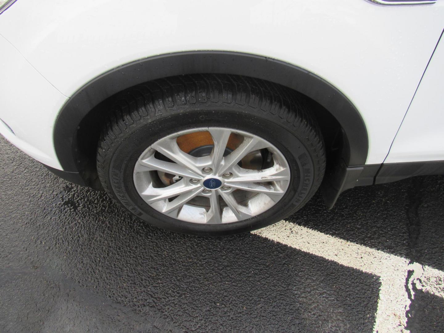 2018 White /Gray Ford Escape SE 4WD (1FMCU9GD5JU) with an 1.5L L4 DOHC 16V engine, 6A transmission, located at 215 Milton St, Dedham, MA, 02026, (781) 329-5144, 42.241905, -71.157295 - This nice little SUV is in excellent condition. Runs like new. All ASPI Motor Cars vehicles are fully serviced before they are delivered to assure the highest quality used vehicle. Call for details Prices on all vehicles do not include $299.95 Documentation fee, as well as Massachusetts sales ta - Photo#10