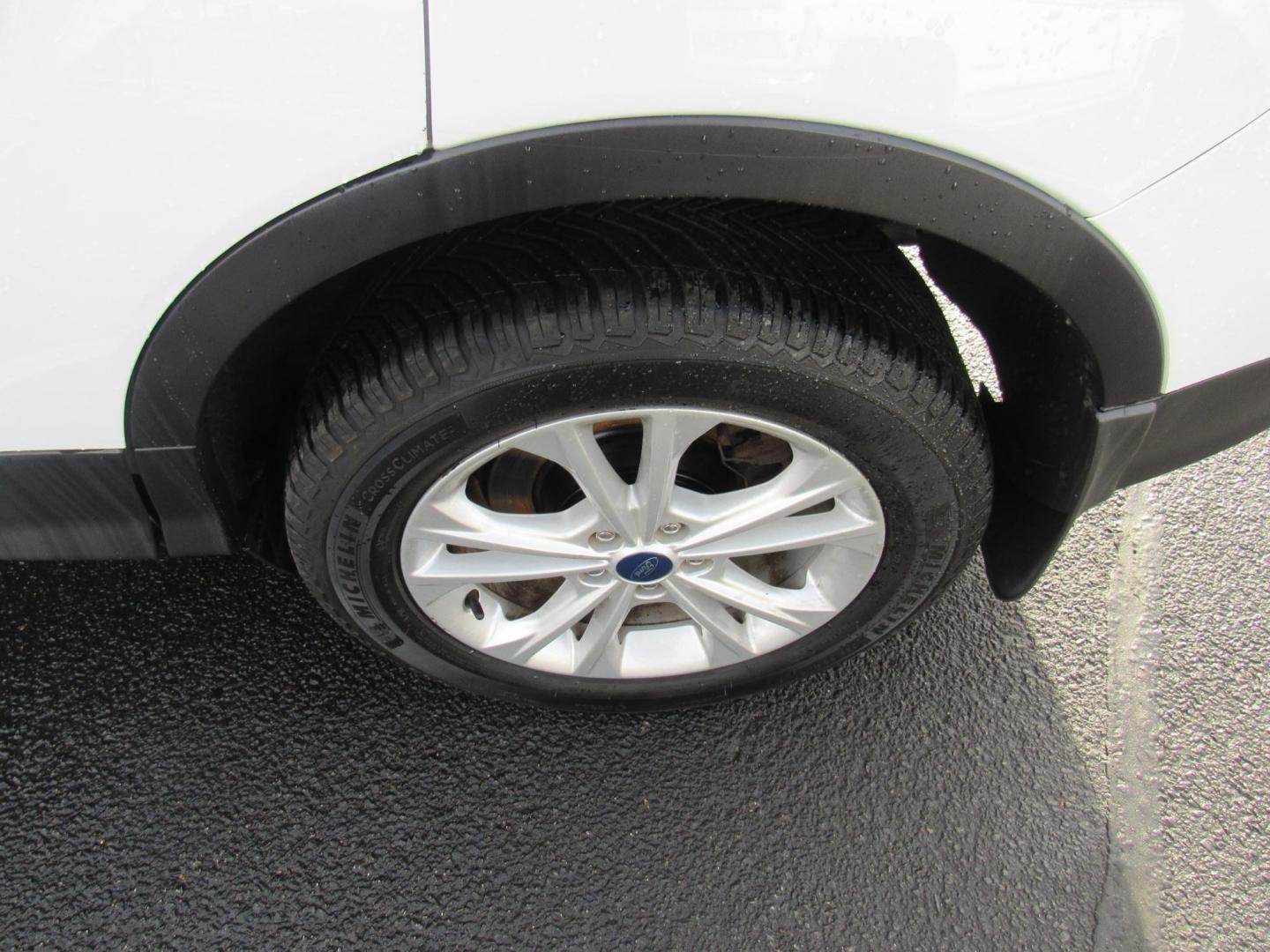 2018 White /Gray Ford Escape SE 4WD (1FMCU9GD5JU) with an 1.5L L4 DOHC 16V engine, 6A transmission, located at 215 Milton St, Dedham, MA, 02026, (781) 329-5144, 42.241905, -71.157295 - This nice little SUV is in excellent condition. Runs like new. All ASPI Motor Cars vehicles are fully serviced before they are delivered to assure the highest quality used vehicle. Call for details Prices on all vehicles do not include $299.95 Documentation fee, as well as Massachusetts sales ta - Photo#11