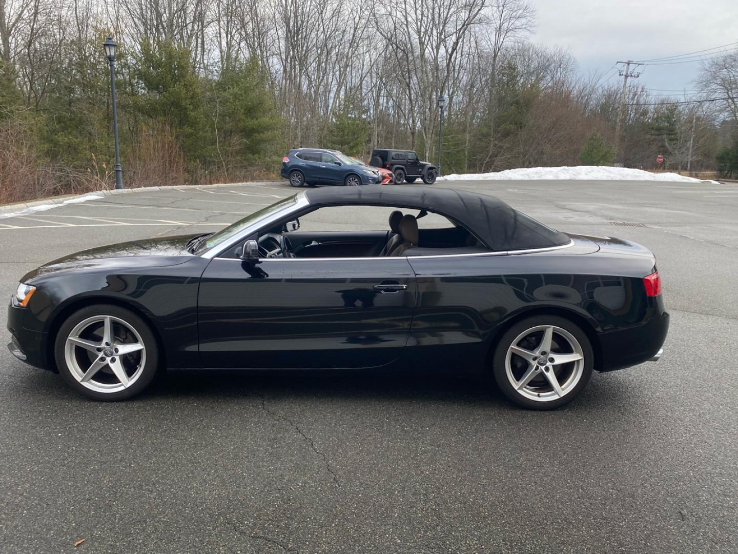 2014 BLACK /saddle Audi A5 Cabriolet 2.0T quattro Tiptronic (WAUCFAFH1EN) with an 2.0L L4 DOHC 16V TURBO engine, 6-Speed Automatic transmission, located at 215 Milton St, Dedham, MA, 02026, (781) 329-5144, 42.241905, -71.157295 - Introducing this sleek 2014 Black Audi A5 - a ride that combines style, performance, and luxury in one package. This sporty coupe comes equipped with all the bells and whistles you could want in a vehicle, from its Alloy Wheels to its Automatic Headlights and even a handy Tire Pressure Monitor. Feel - Photo#5