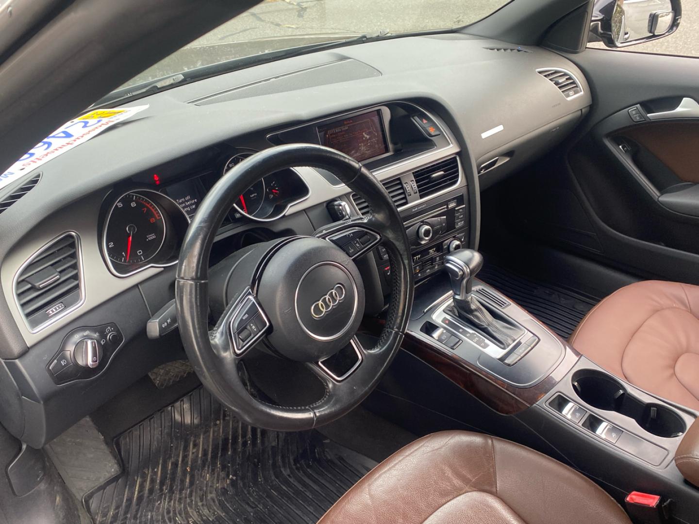 2014 BLACK /saddle Audi A5 Cabriolet 2.0T quattro Tiptronic (WAUCFAFH1EN) with an 2.0L L4 DOHC 16V TURBO engine, 6-Speed Automatic transmission, located at 215 Milton St, Dedham, MA, 02026, (781) 329-5144, 42.241905, -71.157295 - Introducing this sleek 2014 Black Audi A5 - a ride that combines style, performance, and luxury in one package. This sporty coupe comes equipped with all the bells and whistles you could want in a vehicle, from its Alloy Wheels to its Automatic Headlights and even a handy Tire Pressure Monitor. Feel - Photo#9