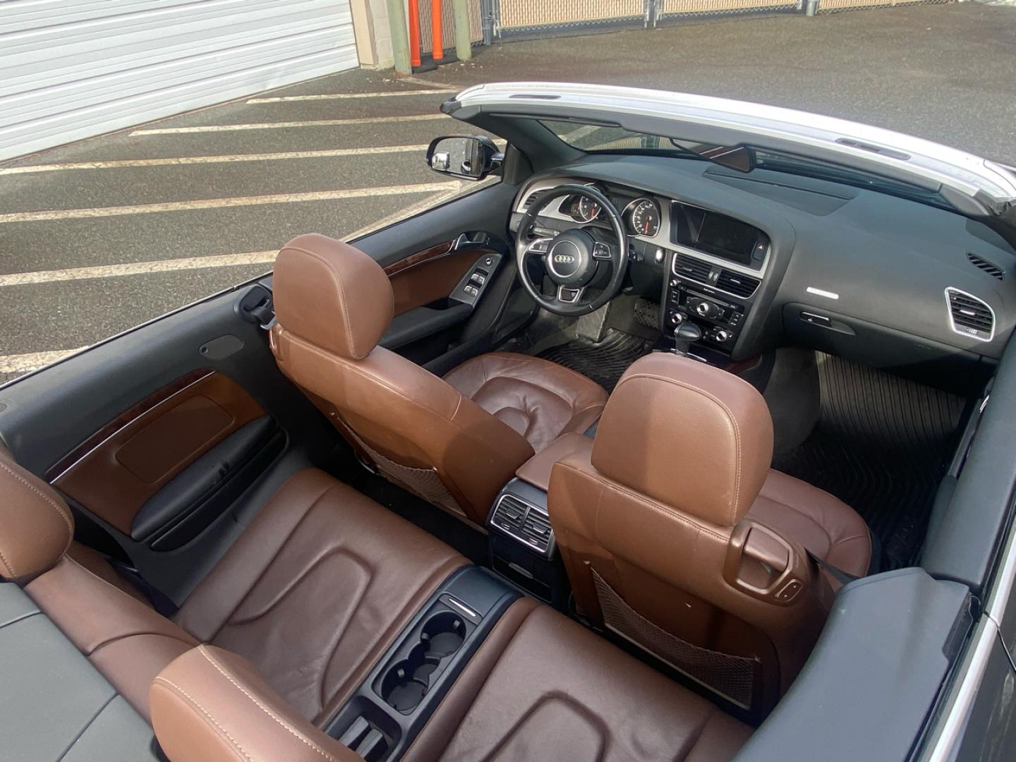 2014 BLACK /saddle Audi A5 Cabriolet 2.0T quattro Tiptronic (WAUCFAFH1EN) with an 2.0L L4 DOHC 16V TURBO engine, 6-Speed Automatic transmission, located at 215 Milton St, Dedham, MA, 02026, (781) 329-5144, 42.241905, -71.157295 - Introducing this sleek 2014 Black Audi A5 - a ride that combines style, performance, and luxury in one package. This sporty coupe comes equipped with all the bells and whistles you could want in a vehicle, from its Alloy Wheels to its Automatic Headlights and even a handy Tire Pressure Monitor. Feel - Photo#13