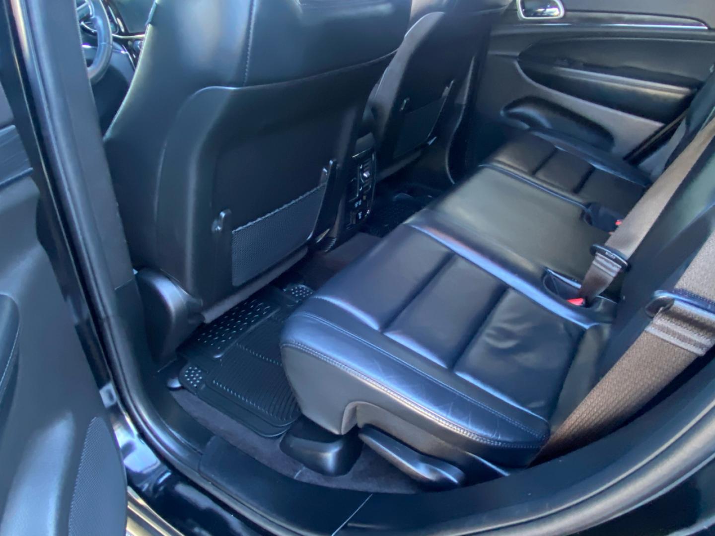 2019 BLACK /Black Jeep Grand Cherokee Limited 4WD (1C4RJFBGXKC) with an 3.6L V6 DOHC 24V engine, Automatic transmission, located at 215 Milton St, Dedham, MA, 02026, (781) 329-5144, 42.241905, -71.157295 - Step into this sleek 2019 Jeep Grand Cherokee, where luxury meets adventure. With a vehicle history report readily available, you can have peace of mind as you hit the road in style. Buckle up and feel the power under the hood as you cruise down the highway, knowing that safety is a top priority wit - Photo#17