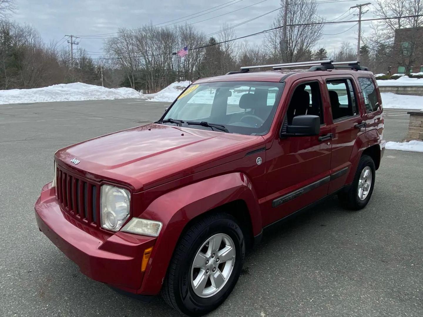 2012 Maroon /Grey Jeep Liberty Sport 4WD (1C4PJMAK9CW) with an 3.7L V6 SOHC 12V engine, 4-Speed Automatic transmission, located at 215 Milton St, Dedham, MA, 02026, (781) 329-5144, 42.241905, -71.157295 - Hop into this vibrant Burgundy 2012 Jeep Liberty and take on the roads with confidence! With its 4WD/AWD capabilities and traction control system, this adventure-ready SUV is perfect for exploring both city streets and off-road trails. Keeping your safety in mind, this Jeep is equipped with multiple - Photo#3