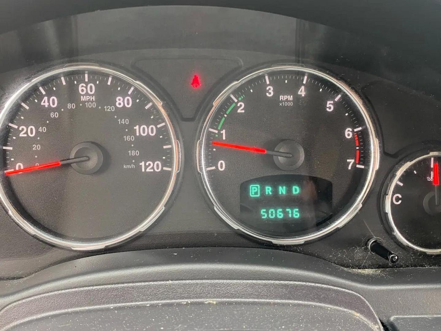 2012 Maroon /Grey Jeep Liberty Sport 4WD (1C4PJMAK9CW) with an 3.7L V6 SOHC 12V engine, 4-Speed Automatic transmission, located at 215 Milton St, Dedham, MA, 02026, (781) 329-5144, 42.241905, -71.157295 - Hop into this vibrant Burgundy 2012 Jeep Liberty and take on the roads with confidence! With its 4WD/AWD capabilities and traction control system, this adventure-ready SUV is perfect for exploring both city streets and off-road trails. Keeping your safety in mind, this Jeep is equipped with multiple - Photo#9