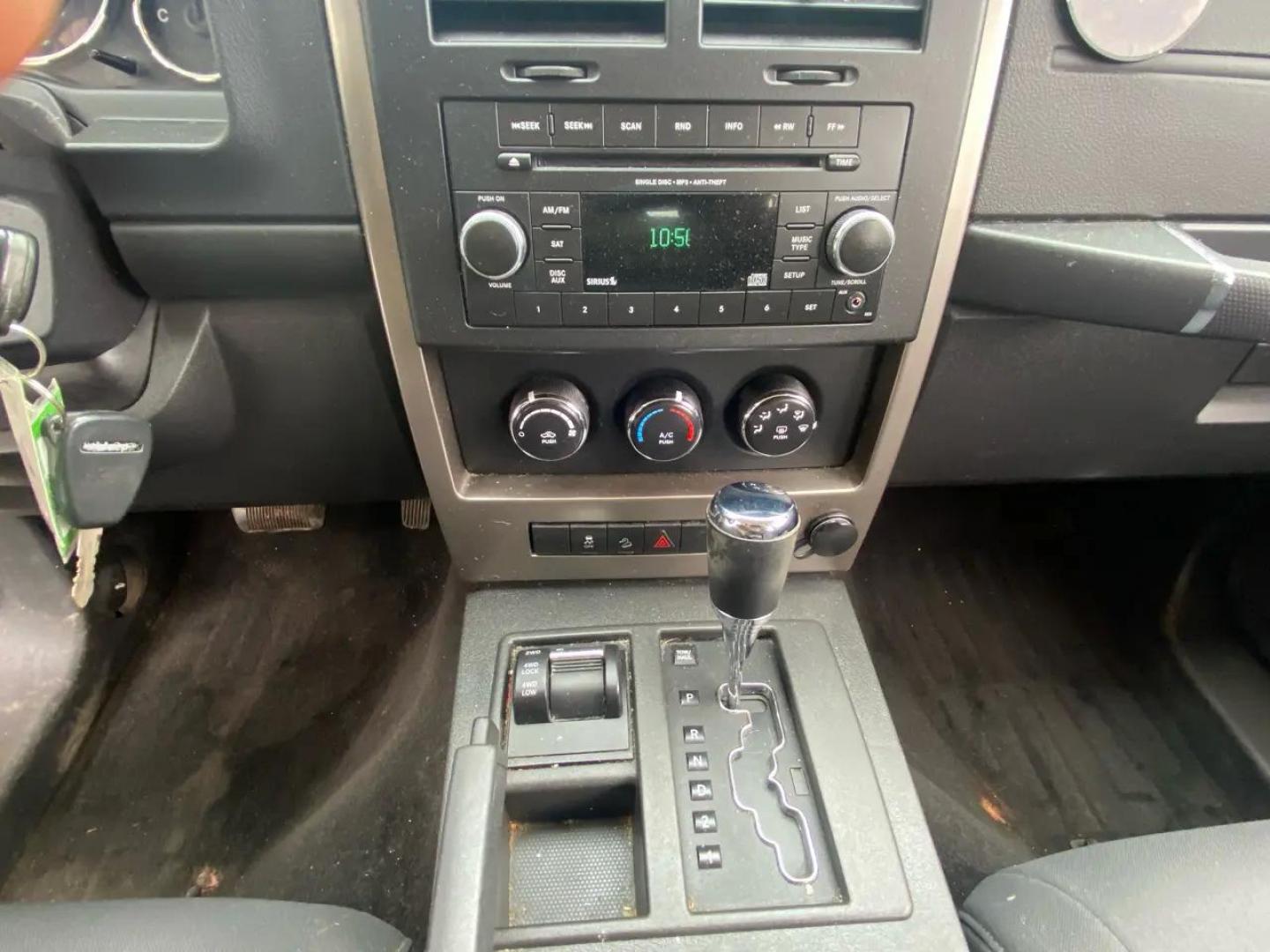 2012 Maroon /Grey Jeep Liberty Sport 4WD (1C4PJMAK9CW) with an 3.7L V6 SOHC 12V engine, 4-Speed Automatic transmission, located at 215 Milton St, Dedham, MA, 02026, (781) 329-5144, 42.241905, -71.157295 - Hop into this vibrant Burgundy 2012 Jeep Liberty and take on the roads with confidence! With its 4WD/AWD capabilities and traction control system, this adventure-ready SUV is perfect for exploring both city streets and off-road trails. Keeping your safety in mind, this Jeep is equipped with multiple - Photo#10