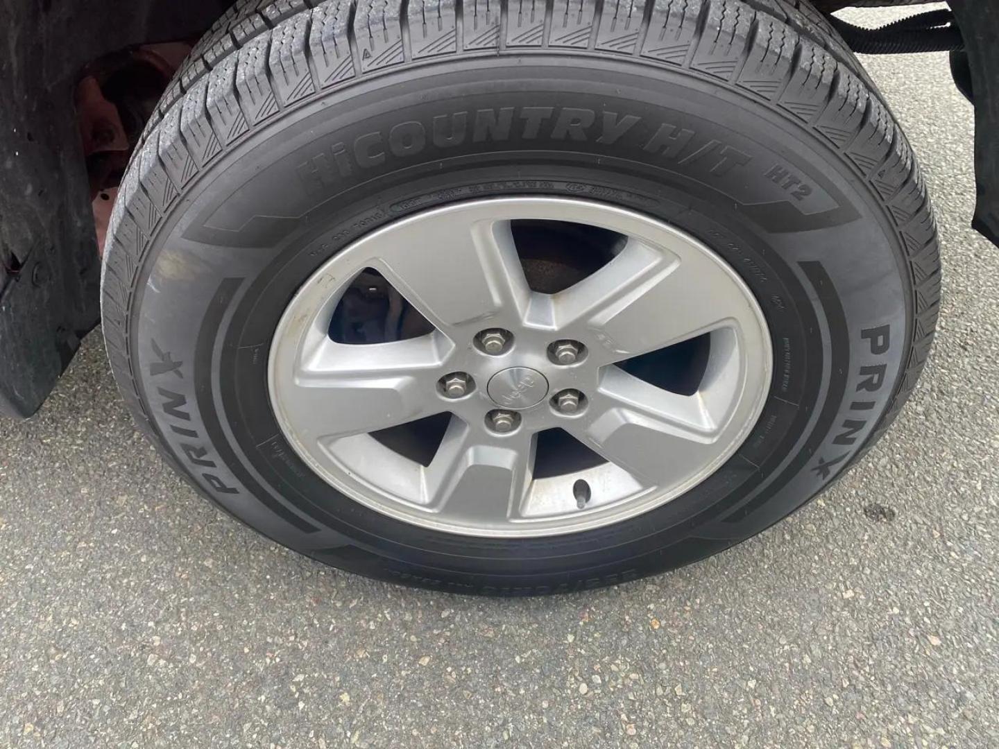 2012 Maroon /Grey Jeep Liberty Sport 4WD (1C4PJMAK9CW) with an 3.7L V6 SOHC 12V engine, 4-Speed Automatic transmission, located at 215 Milton St, Dedham, MA, 02026, (781) 329-5144, 42.241905, -71.157295 - Hop into this vibrant Burgundy 2012 Jeep Liberty and take on the roads with confidence! With its 4WD/AWD capabilities and traction control system, this adventure-ready SUV is perfect for exploring both city streets and off-road trails. Keeping your safety in mind, this Jeep is equipped with multiple - Photo#17