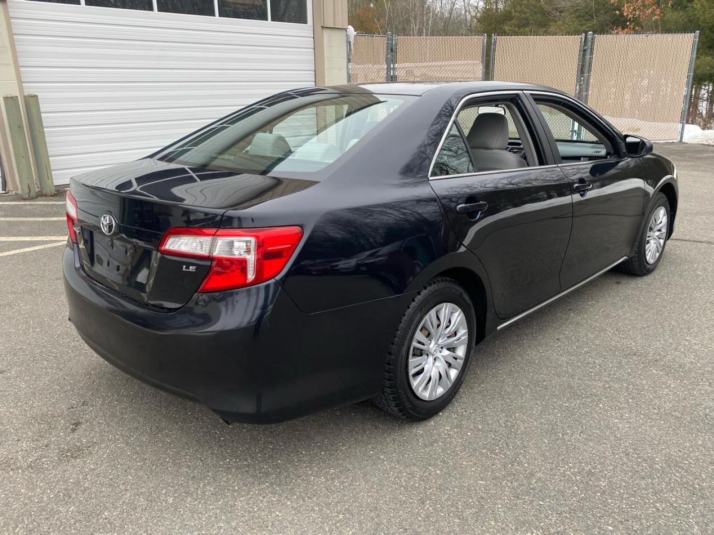 2012 BLACK /Grey Toyota Camry LE (4T1BF1FK8CU) with an 2.5L L4 DOHC 16V engine, 6-Speed Automatic transmission, located at 215 Milton St, Dedham, MA, 02026, (781) 329-5144, 42.241905, -71.157295 - Introducing the sleek and reliable 2012 Toyota Camry, a car that promises to take your driving experience to the next level. This sophisticated black beauty is not just a vehicle, but a true companion on the road. With a Carfax report available, you can rest assured that this Camry has a clean histo - Photo#2