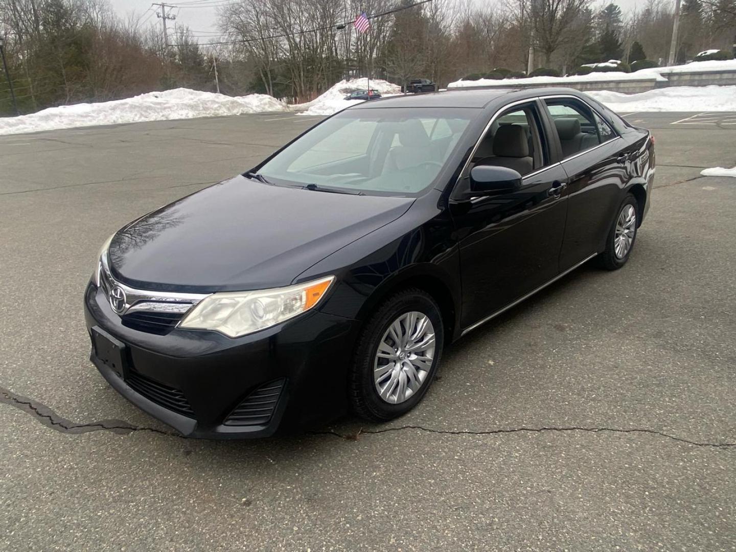 2012 BLACK /Grey Toyota Camry LE (4T1BF1FK8CU) with an 2.5L L4 DOHC 16V engine, 6-Speed Automatic transmission, located at 215 Milton St, Dedham, MA, 02026, (781) 329-5144, 42.241905, -71.157295 - Introducing the sleek and reliable 2012 Toyota Camry, a car that promises to take your driving experience to the next level. This sophisticated black beauty is not just a vehicle, but a true companion on the road. With a Carfax report available, you can rest assured that this Camry has a clean histo - Photo#4