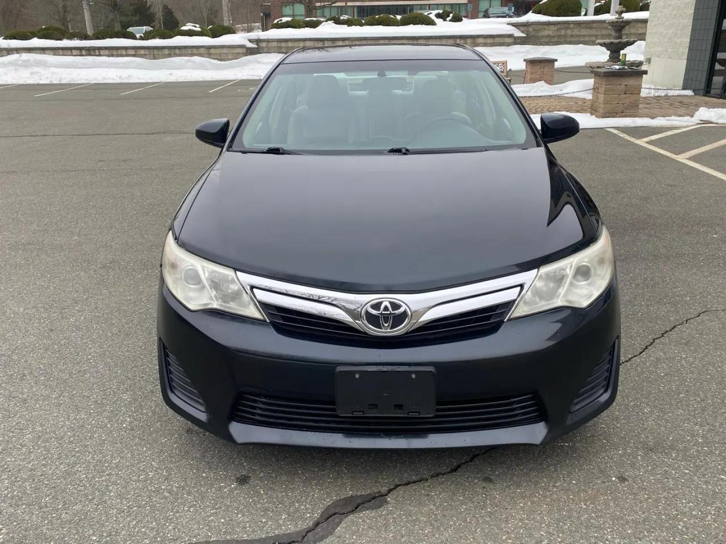 2012 BLACK /Grey Toyota Camry LE (4T1BF1FK8CU) with an 2.5L L4 DOHC 16V engine, 6-Speed Automatic transmission, located at 215 Milton St, Dedham, MA, 02026, (781) 329-5144, 42.241905, -71.157295 - Introducing the sleek and reliable 2012 Toyota Camry, a car that promises to take your driving experience to the next level. This sophisticated black beauty is not just a vehicle, but a true companion on the road. With a Carfax report available, you can rest assured that this Camry has a clean histo - Photo#6