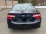 2012 BLACK /Grey Toyota Camry LE (4T1BF1FK8CU) with an 2.5L L4 DOHC 16V engine, 6-Speed Automatic transmission, located at 215 Milton St, Dedham, MA, 02026, (781) 329-5144, 42.241905, -71.157295 - Introducing the sleek and reliable 2012 Toyota Camry, a car that promises to take your driving experience to the next level. This sophisticated black beauty is not just a vehicle, but a true companion on the road. With a Carfax report available, you can rest assured that this Camry has a clean histo - Photo#7