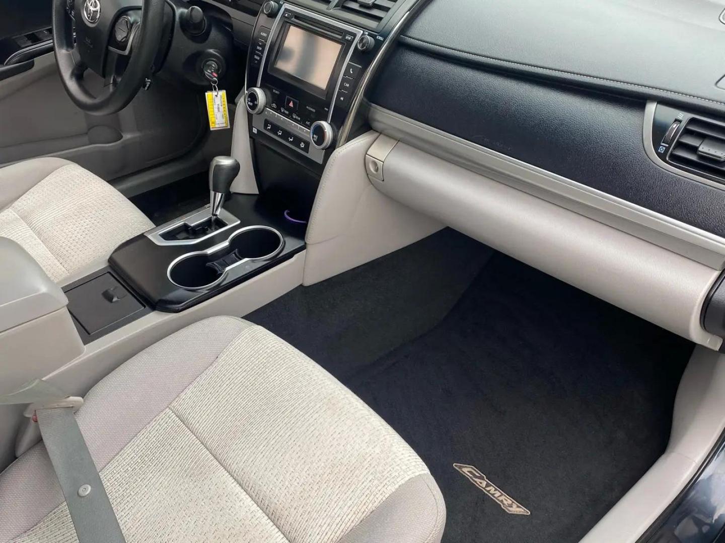 2012 BLACK /Grey Toyota Camry LE (4T1BF1FK8CU) with an 2.5L L4 DOHC 16V engine, 6-Speed Automatic transmission, located at 215 Milton St, Dedham, MA, 02026, (781) 329-5144, 42.241905, -71.157295 - Introducing the sleek and reliable 2012 Toyota Camry, a car that promises to take your driving experience to the next level. This sophisticated black beauty is not just a vehicle, but a true companion on the road. With a Carfax report available, you can rest assured that this Camry has a clean histo - Photo#11