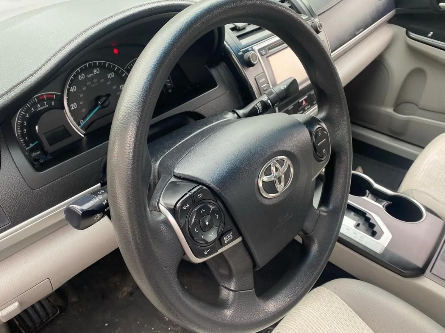 2012 BLACK /Grey Toyota Camry LE (4T1BF1FK8CU) with an 2.5L L4 DOHC 16V engine, 6-Speed Automatic transmission, located at 215 Milton St, Dedham, MA, 02026, (781) 329-5144, 42.241905, -71.157295 - Introducing the sleek and reliable 2012 Toyota Camry, a car that promises to take your driving experience to the next level. This sophisticated black beauty is not just a vehicle, but a true companion on the road. With a Carfax report available, you can rest assured that this Camry has a clean histo - Photo#9