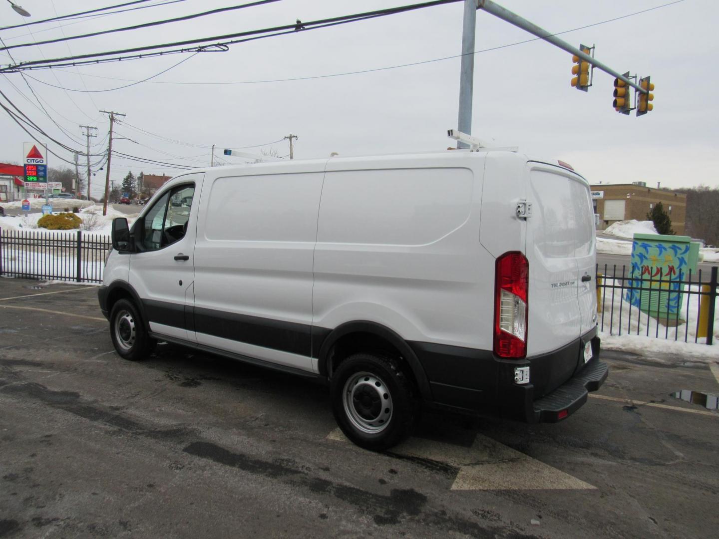 2016 White /Gray Ford Transit 250 Van Low Roof 60/40 Pass.130-in. WB (1FTYR1ZM5GK) with an 3.7L V6 DOHC 24V engine, 6A transmission, located at 215 Milton St, Dedham, MA, 02026, (781) 329-5144, 42.241905, -71.157295 - This nice low mileage cargo van is in excellent condition. Runs like new. All ASPI Motor Cras Vehicles are fully serviced before they are delivered to assure the highest quality used vehicles. Commercial service contracts are available. Call for details. Prices on all vehicles do not include $29 - Photo#4