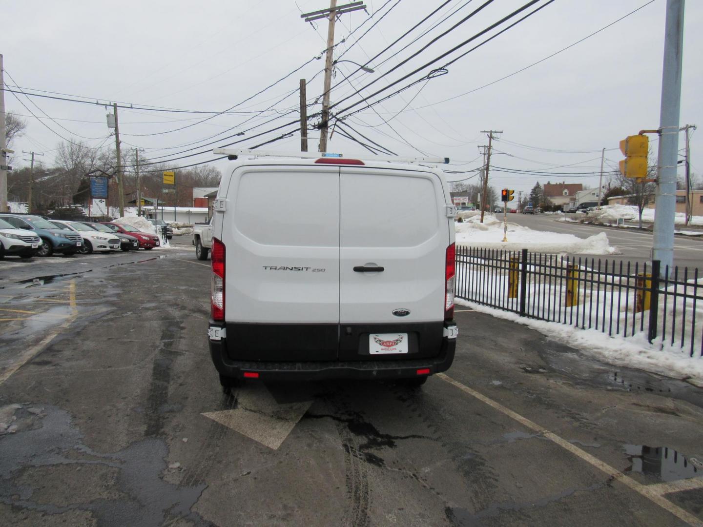 2016 White /Gray Ford Transit 250 Van Low Roof 60/40 Pass.130-in. WB (1FTYR1ZM5GK) with an 3.7L V6 DOHC 24V engine, 6A transmission, located at 215 Milton St, Dedham, MA, 02026, (781) 329-5144, 42.241905, -71.157295 - This nice low mileage cargo van is in excellent condition. Runs like new. All ASPI Motor Cras Vehicles are fully serviced before they are delivered to assure the highest quality used vehicles. Commercial service contracts are available. Call for details. Prices on all vehicles do not include $29 - Photo#5