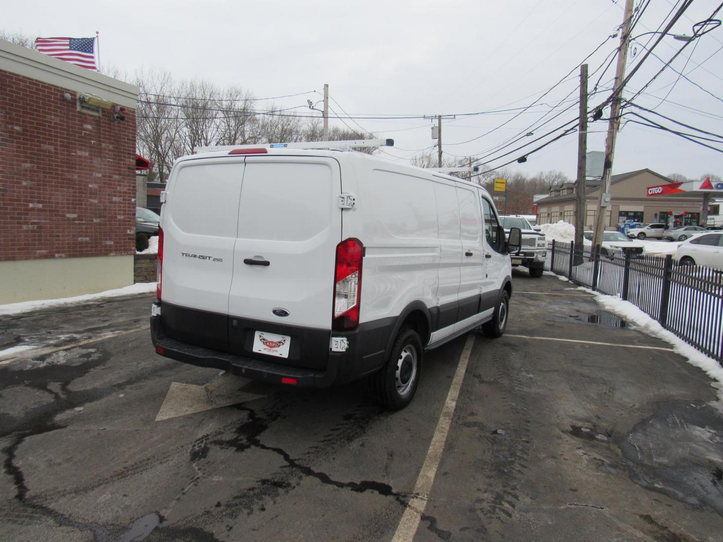 2016 White /Gray Ford Transit 250 Van Low Roof 60/40 Pass.130-in. WB (1FTYR1ZM5GK) with an 3.7L V6 DOHC 24V engine, 6A transmission, located at 215 Milton St, Dedham, MA, 02026, (781) 329-5144, 42.241905, -71.157295 - This nice low mileage cargo van is in excellent condition. Runs like new. All ASPI Motor Cras Vehicles are fully serviced before they are delivered to assure the highest quality used vehicles. Commercial service contracts are available. Call for details. Prices on all vehicles do not include $29 - Photo#6