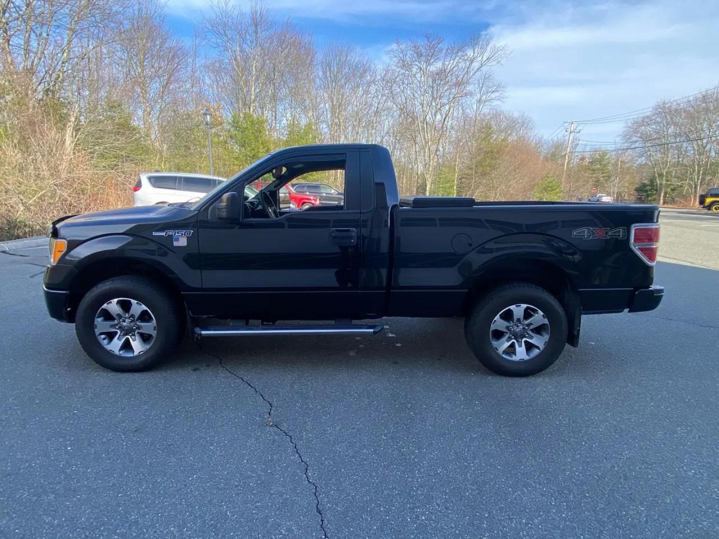 2013 BLACK /gray Ford F-150 SR-5 (1FTMF1EM5DF) with an 3.5L V6 SOHC 24V engine, Automatic transmission, located at 215 Milton St, Dedham, MA, 02026, (781) 329-5144, 42.241905, -71.157295 - Get ready to hit the road in style with this sleek and powerful 2013 Ford F-150! This black beauty not only looks great but packs a punch with its 4WD/AWD capability, ensuring you can handle any terrain with ease. Safety is a top priority with ABS brakes, traction control, and a full array of airbag - Photo#4