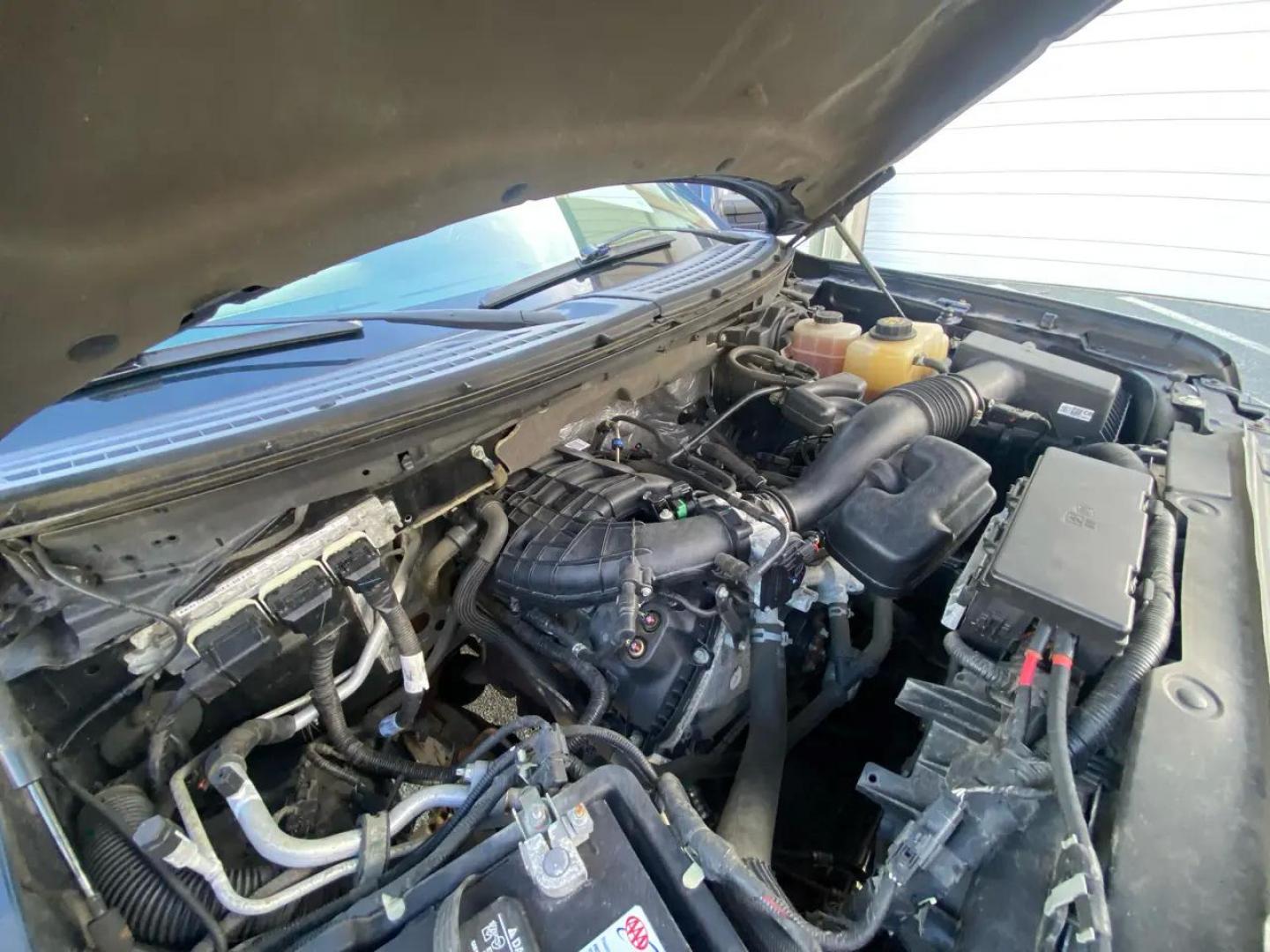 2013 BLACK /gray Ford F-150 SR-5 (1FTMF1EM5DF) with an 3.5L V6 SOHC 24V engine, Automatic transmission, located at 215 Milton St, Dedham, MA, 02026, (781) 329-5144, 42.241905, -71.157295 - Get ready to hit the road in style with this sleek and powerful 2013 Ford F-150! This black beauty not only looks great but packs a punch with its 4WD/AWD capability, ensuring you can handle any terrain with ease. Safety is a top priority with ABS brakes, traction control, and a full array of airbag - Photo#21