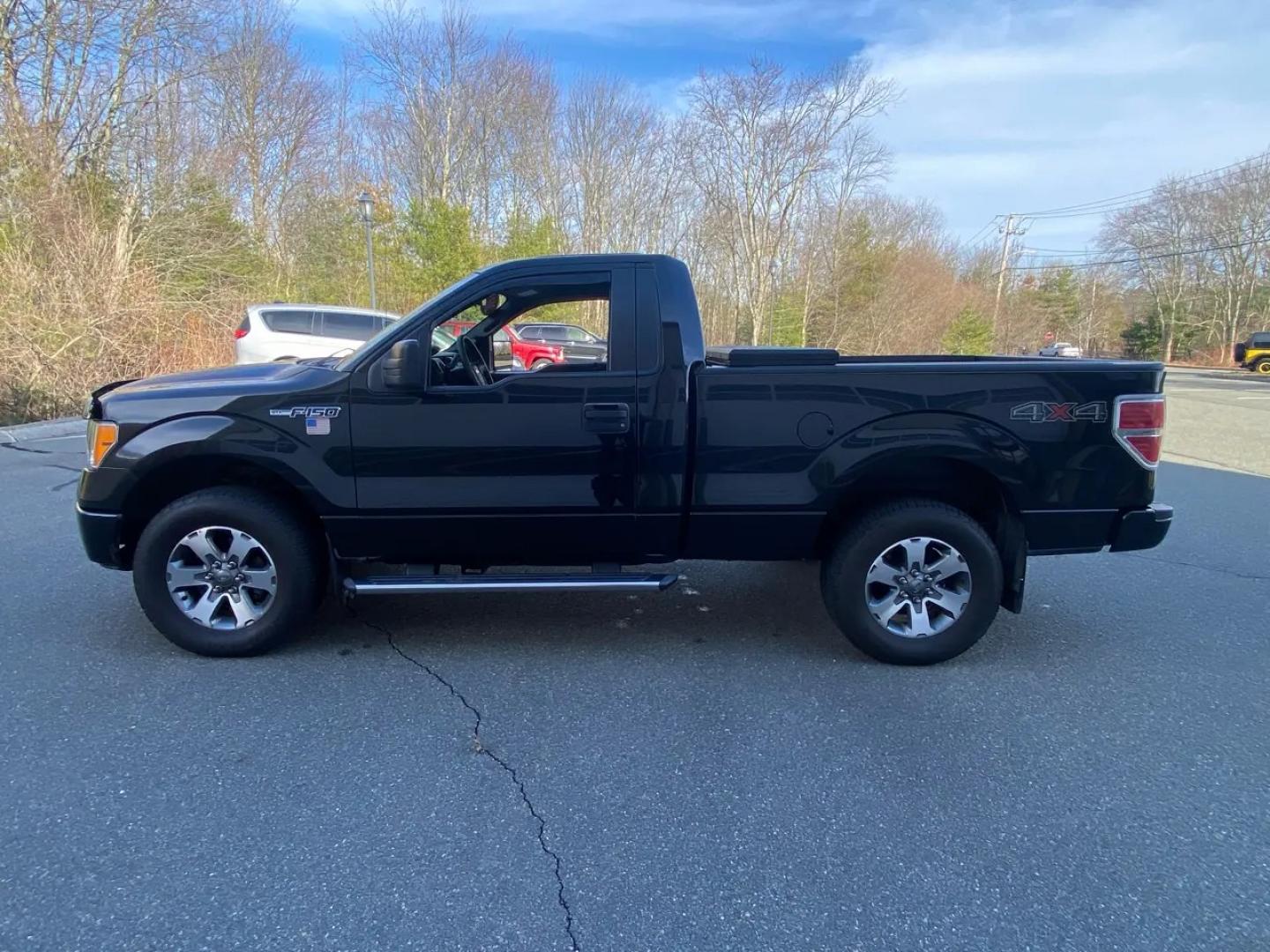 2013 BLACK /gray Ford F-150 SR-5 (1FTMF1EM5DF) with an 3.5L V6 SOHC 24V engine, Automatic transmission, located at 215 Milton St, Dedham, MA, 02026, (781) 329-5144, 42.241905, -71.157295 - Get ready to hit the road in style with this sleek and powerful 2013 Ford F-150! This black beauty not only looks great but packs a punch with its 4WD/AWD capability, ensuring you can handle any terrain with ease. Safety is a top priority with ABS brakes, traction control, and a full array of airbag- Photo#4