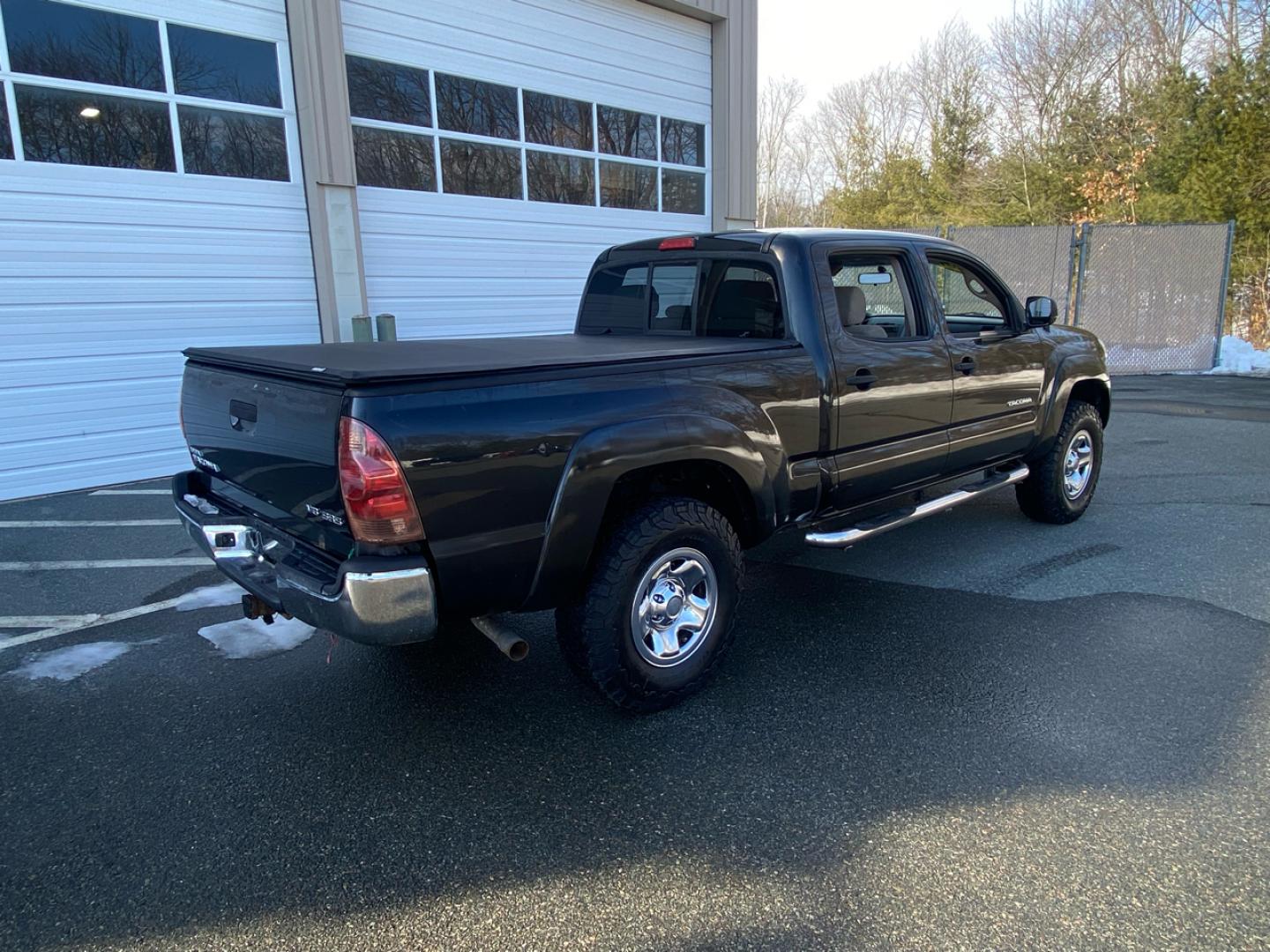 2007 BLACK /Tan Toyota TACOMA SR-5 (1FTMF1EM5DF) with an 3.5L V6 SOHC 24V engine, Automatic transmission, located at 215 Milton St, Dedham, MA, 02026, (781) 329-5144, 42.241905, -71.157295 - Introducing this sleek Black 2007 Toyota Tacoma! This rugged beauty is the perfect blend of style, versatility, and reliability. With its powerful engine and 4WD/AWD capabilities, this truck is ready to conquer any road ahead. The deep tinted glass adds a touch of mystery while keeping you cool on t - Photo#2