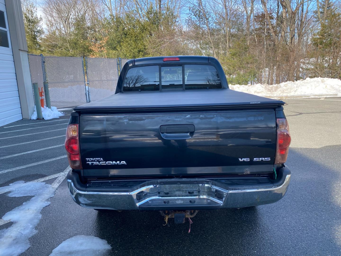 2007 BLACK /Tan Toyota TACOMA SR-5 (1FTMF1EM5DF) with an 3.5L V6 SOHC 24V engine, Automatic transmission, located at 215 Milton St, Dedham, MA, 02026, (781) 329-5144, 42.241905, -71.157295 - Introducing this sleek Black 2007 Toyota Tacoma! This rugged beauty is the perfect blend of style, versatility, and reliability. With its powerful engine and 4WD/AWD capabilities, this truck is ready to conquer any road ahead. The deep tinted glass adds a touch of mystery while keeping you cool on t - Photo#7