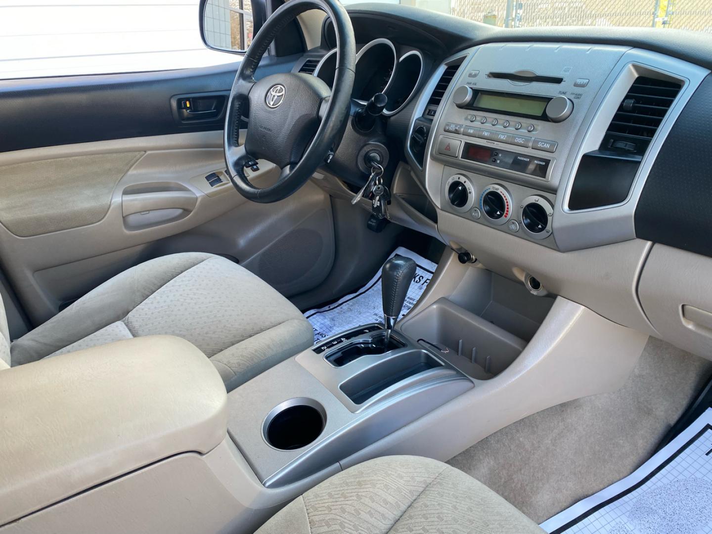 2007 BLACK /Tan Toyota TACOMA SR-5 (1FTMF1EM5DF) with an 3.5L V6 SOHC 24V engine, Automatic transmission, located at 215 Milton St, Dedham, MA, 02026, (781) 329-5144, 42.241905, -71.157295 - Introducing this sleek Black 2007 Toyota Tacoma! This rugged beauty is the perfect blend of style, versatility, and reliability. With its powerful engine and 4WD/AWD capabilities, this truck is ready to conquer any road ahead. The deep tinted glass adds a touch of mystery while keeping you cool on t - Photo#10