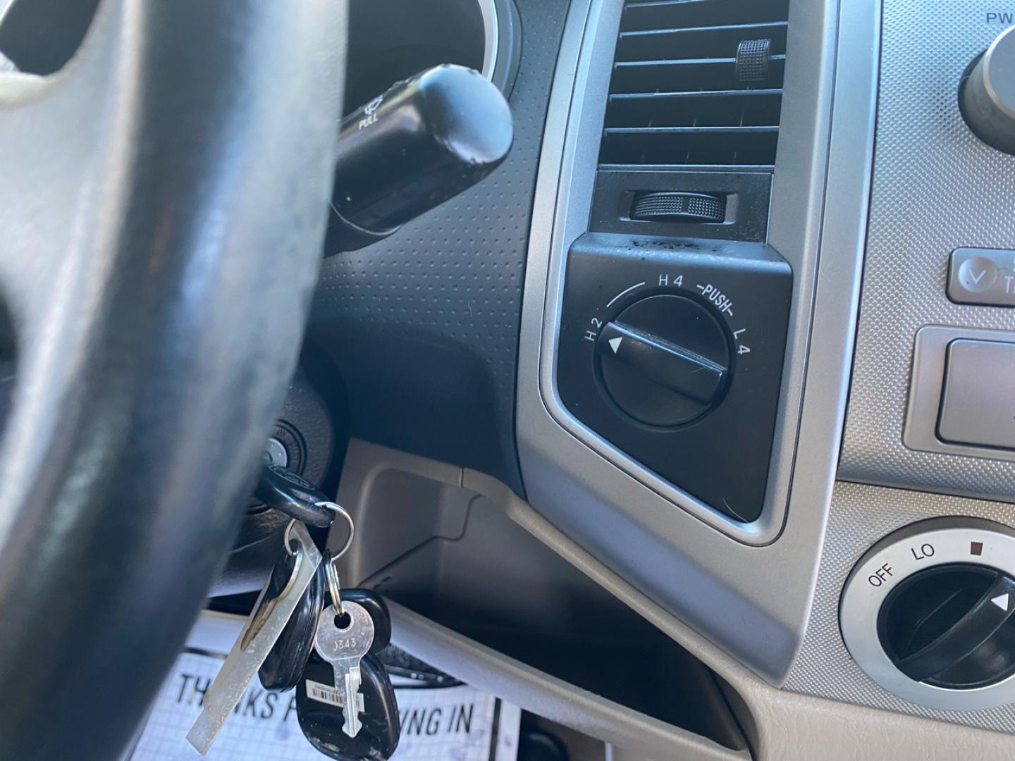2007 BLACK /Tan Toyota TACOMA SR-5 (1FTMF1EM5DF) with an 3.5L V6 SOHC 24V engine, Automatic transmission, located at 215 Milton St, Dedham, MA, 02026, (781) 329-5144, 42.241905, -71.157295 - Introducing this sleek Black 2007 Toyota Tacoma! This rugged beauty is the perfect blend of style, versatility, and reliability. With its powerful engine and 4WD/AWD capabilities, this truck is ready to conquer any road ahead. The deep tinted glass adds a touch of mystery while keeping you cool on t - Photo#11