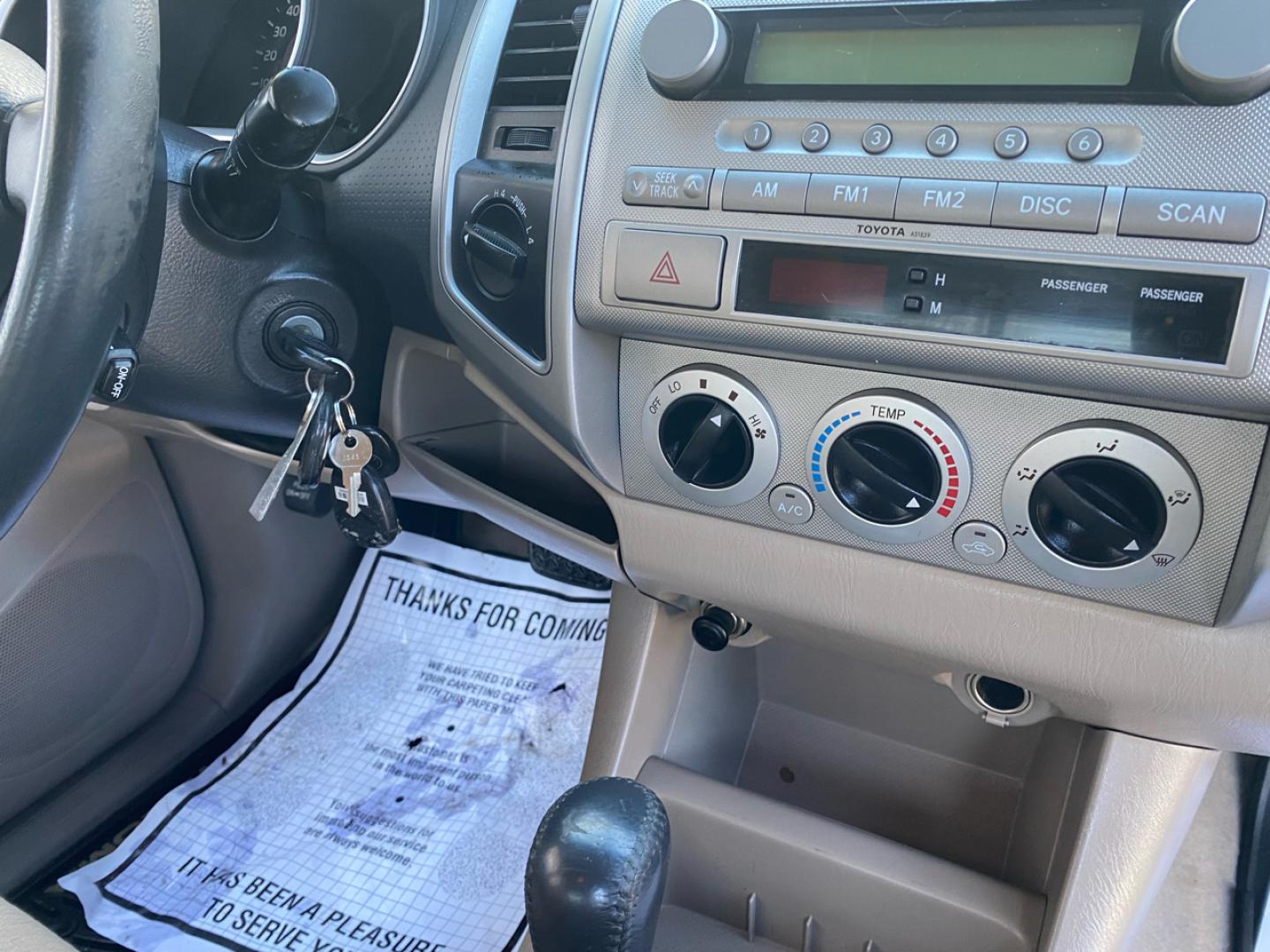 2007 BLACK /Tan Toyota TACOMA SR-5 (1FTMF1EM5DF) with an 3.5L V6 SOHC 24V engine, Automatic transmission, located at 215 Milton St, Dedham, MA, 02026, (781) 329-5144, 42.241905, -71.157295 - Introducing this sleek Black 2007 Toyota Tacoma! This rugged beauty is the perfect blend of style, versatility, and reliability. With its powerful engine and 4WD/AWD capabilities, this truck is ready to conquer any road ahead. The deep tinted glass adds a touch of mystery while keeping you cool on t - Photo#12