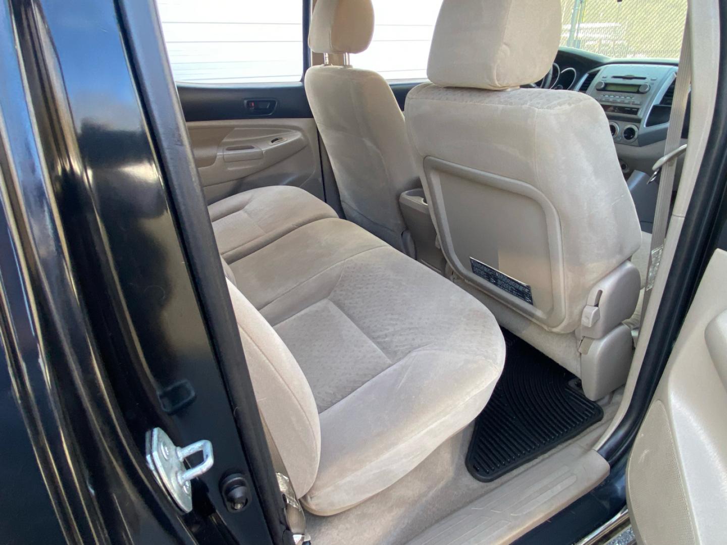 2007 BLACK /Tan Toyota Tacoma Double Cab Long Bed V6 Auto 4WD (5TEMU52N57Z) with an 4.0L V6 DOHC 24V engine, 5-Speed Automatic Overdrive transmission, located at 215 Milton St, Dedham, MA, 02026, (781) 329-5144, 42.241905, -71.157295 - Introducing this sleek Black 2007 Toyota Tacoma! This rugged beauty is the perfect blend of style, versatility, and reliability. With its powerful engine and 4WD/AWD capabilities, this truck is ready to conquer any road ahead. The deep tinted glass adds a touch of mystery while keeping you cool on t - Photo#13