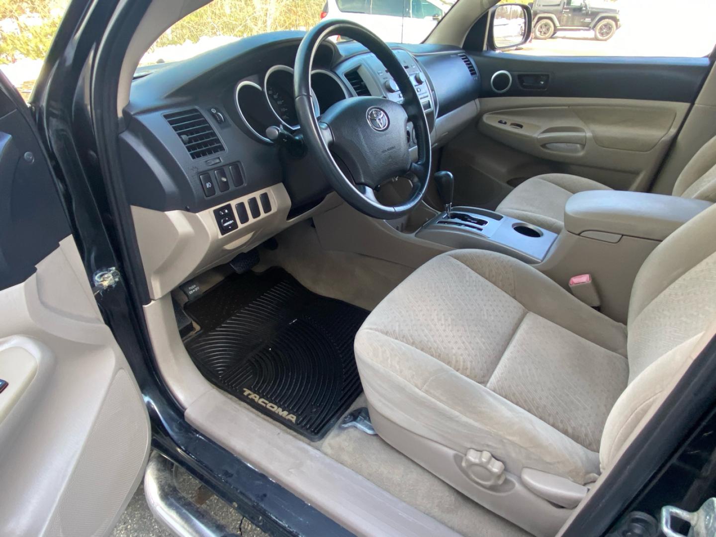 2007 BLACK /Tan Toyota Tacoma Double Cab Long Bed V6 Auto 4WD (5TEMU52N57Z) with an 4.0L V6 DOHC 24V engine, 5-Speed Automatic Overdrive transmission, located at 215 Milton St, Dedham, MA, 02026, (781) 329-5144, 42.241905, -71.157295 - Introducing this sleek Black 2007 Toyota Tacoma! This rugged beauty is the perfect blend of style, versatility, and reliability. With its powerful engine and 4WD/AWD capabilities, this truck is ready to conquer any road ahead. The deep tinted glass adds a touch of mystery while keeping you cool on t - Photo#15