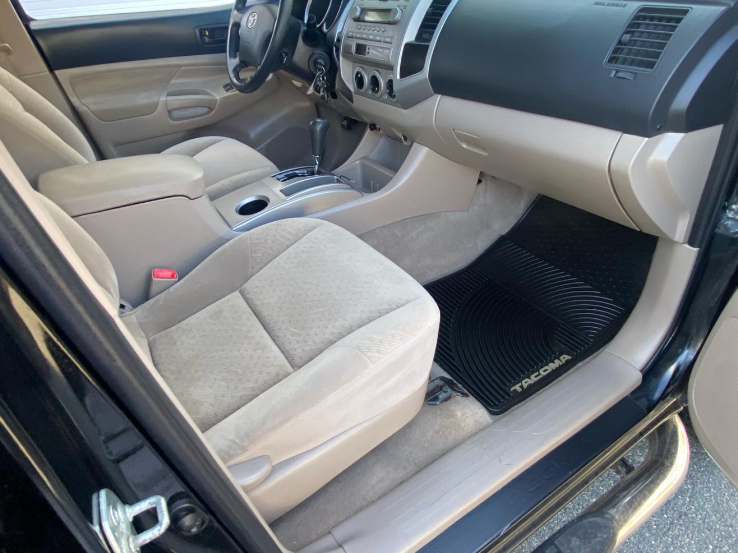 2007 BLACK /Tan Toyota Tacoma Double Cab Long Bed V6 Auto 4WD (5TEMU52N57Z) with an 4.0L V6 DOHC 24V engine, 5-Speed Automatic Overdrive transmission, located at 215 Milton St, Dedham, MA, 02026, (781) 329-5144, 42.241905, -71.157295 - Introducing this sleek Black 2007 Toyota Tacoma! This rugged beauty is the perfect blend of style, versatility, and reliability. With its powerful engine and 4WD/AWD capabilities, this truck is ready to conquer any road ahead. The deep tinted glass adds a touch of mystery while keeping you cool on t - Photo#12