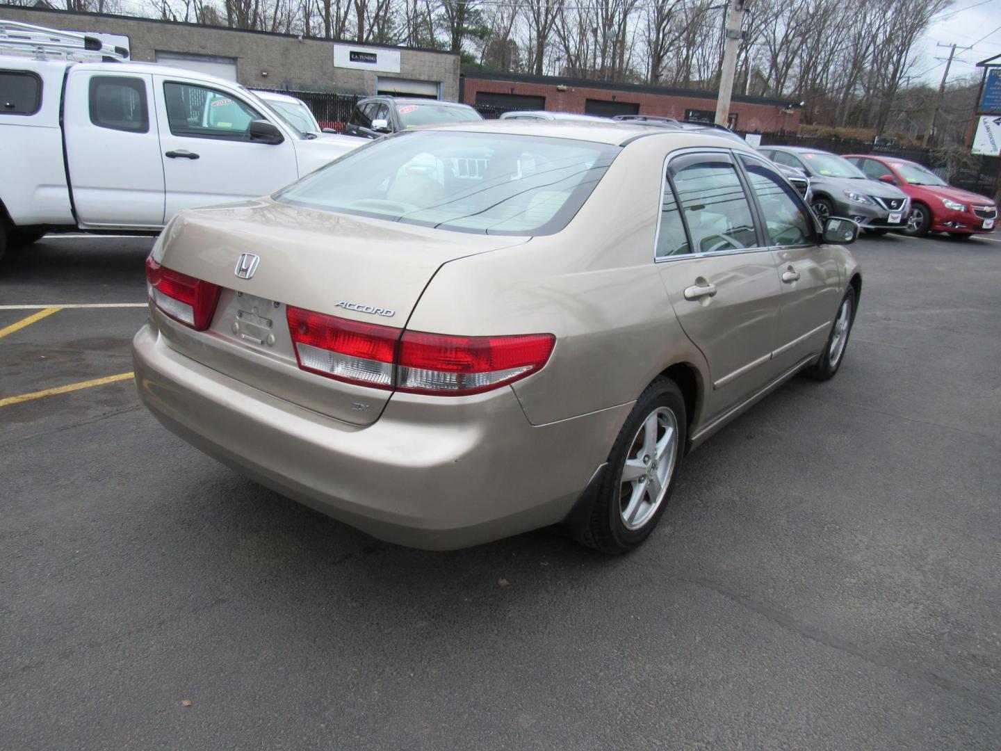 2004 Tan /BROWN Honda Accord EX sedan AT (1HGCM56614A) with an 2.4L L4 DOHC 16V engine, 5-Speed Automatic Overdrive transmission, located at 215 Milton St, Dedham, MA, 02026, (781) 329-5144, 42.241905, -71.157295 - This little sedan is far from perfect, but it is reliable transportation. Paint has scratches and lots of touch up. Overall, it looks OK Lots of life left in this low mileage vehicle. Great for a kids first car or a commuter vehicle to Boston. All ASPI Motor Cars vehicles are fully serviced before t - Photo#5