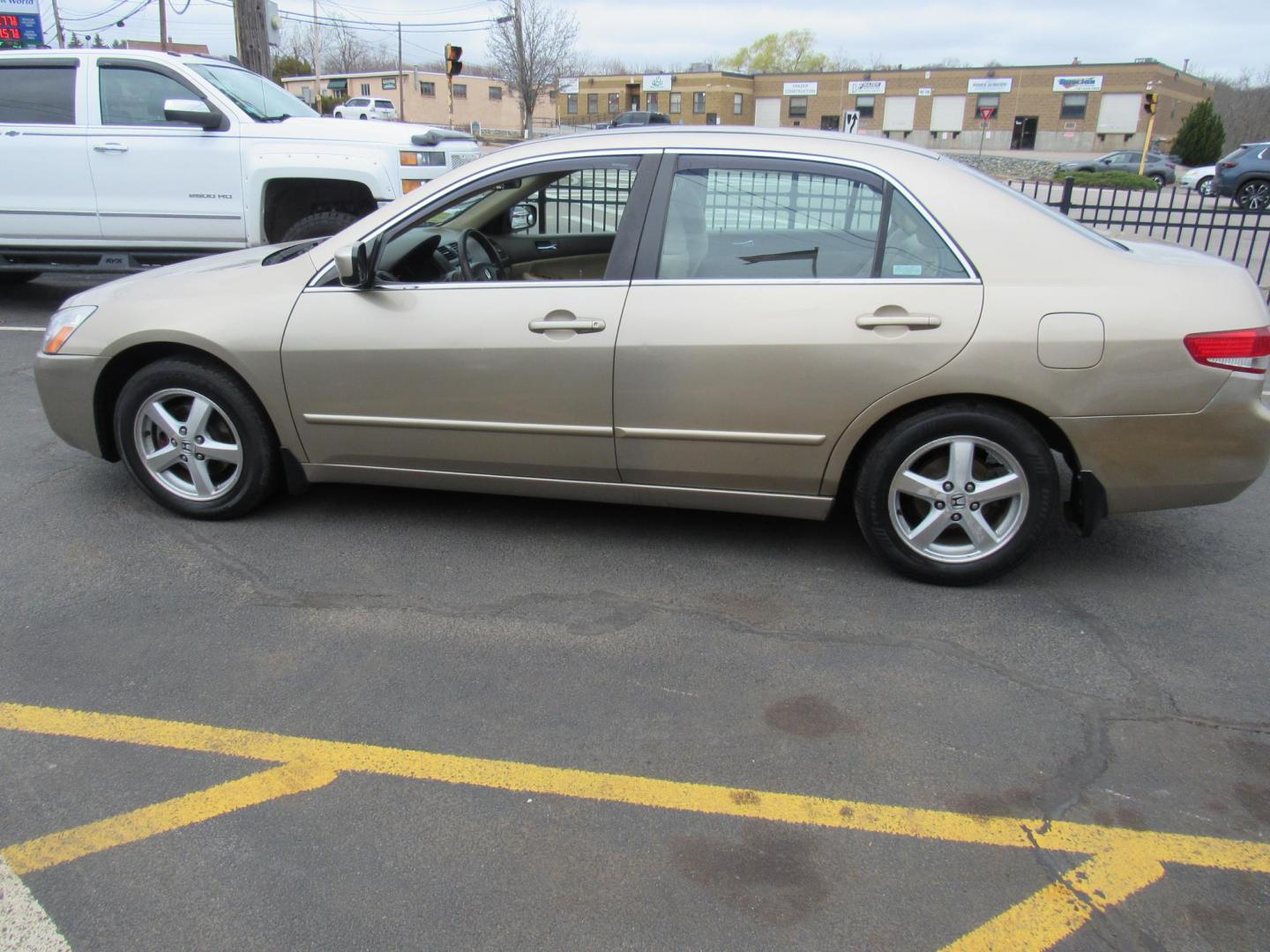 2004 Tan /BROWN Honda Accord EX sedan AT (1HGCM56614A) with an 2.4L L4 DOHC 16V engine, 5-Speed Automatic Overdrive transmission, located at 215 Milton St, Dedham, MA, 02026, (781) 329-5144, 42.241905, -71.157295 - This little sedan is far from perfect, but it is reliable transportation. Paint has scratches and lots of touch up. Overall, it looks OK Lots of life left in this low mileage vehicle. Great for a kids first car or a commuter vehicle to Boston. All ASPI Motor Cars vehicles are fully serviced before t - Photo#1