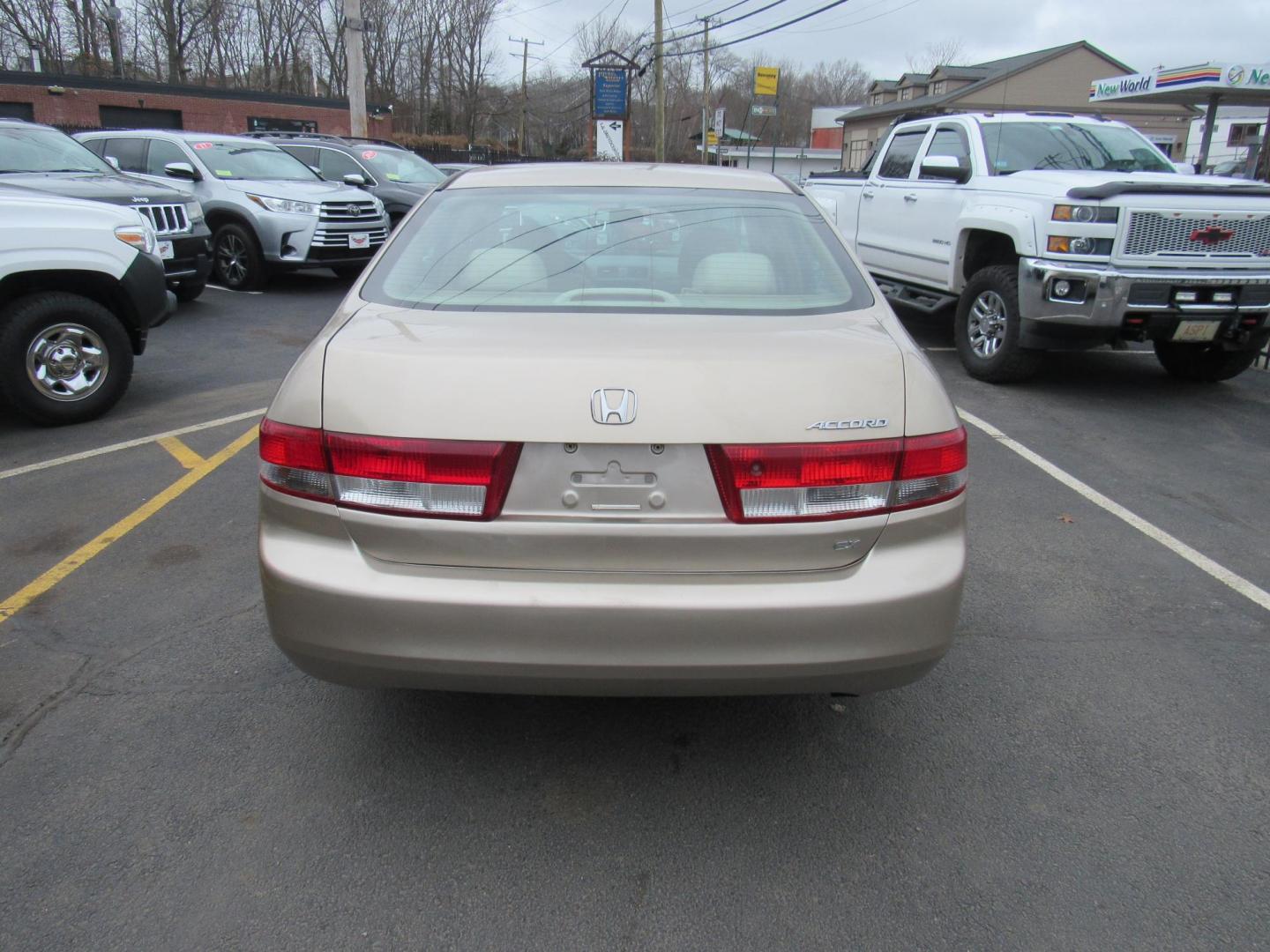 2004 Tan /BROWN Honda Accord EX sedan AT (1HGCM56614A) with an 2.4L L4 DOHC 16V engine, 5-Speed Automatic Overdrive transmission, located at 215 Milton St, Dedham, MA, 02026, (781) 329-5144, 42.241905, -71.157295 - This little sedan is far from perfect, but it is reliable transportation. Paint has scratches and lots of touch up. Overall, it looks OK Lots of life left in this low mileage vehicle. Great for a kids first car or a commuter vehicle to Boston. All ASPI Motor Cars vehicles are fully serviced before t - Photo#4
