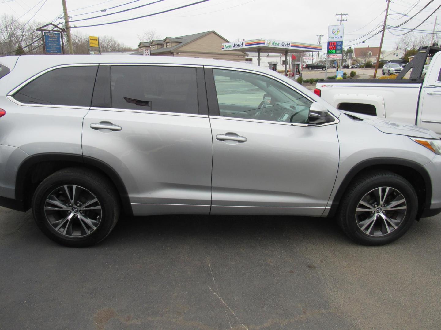 2017 SILVER /Gray Toyota Highlander LE FWD I4 (5TDZARFH4HS) with an 2.7L L4 DOHC 16V engine, 6A transmission, located at 215 Milton St, Dedham, MA, 02026, (781) 329-5144, 42.241905, -71.157295 - This dependable 7 passenger vehicle is ready for the family. The vehicle has a few scratches and paint work but overall is very clean. Runs great. All ASPI Motor Cars vehicles are fully serviced before they are delivered to assure the highest quality used vehicles. Come with a 3/3 warranty included - Photo#7