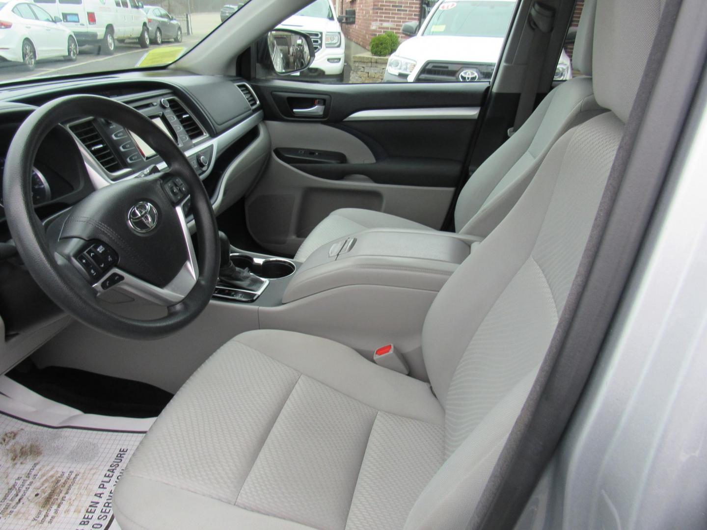2017 SILVER /Gray Toyota Highlander LE FWD I4 (5TDZARFH4HS) with an 2.7L L4 DOHC 16V engine, 6A transmission, located at 215 Milton St, Dedham, MA, 02026, (781) 329-5144, 42.241905, -71.157295 - This dependable 7 passenger vehicle is ready for the family. The vehicle has a few scratches and paint work but overall is very clean. Runs great. All ASPI Motor Cars vehicles are fully serviced before they are delivered to assure the highest quality used vehicles. Come with a 3/3 warranty included - Photo#12