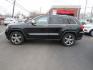 2013 BLACK /Tan Jeep Grand Cherokee Overland 4WD (1C4RJFCT6DC) with an 5.7L V8 OHV 16V engine, 5-Speed Automatic transmission, located at 215 Milton St, Dedham, MA, 02026, (781) 329-5144, 42.241905, -71.157295 - There is not many options this low mile Grand Cherokee does not have. Summit edition, panoramic roof, Leather, Loaded up. In excellent condition for the year, you won't believe it is a 2013. All ASPI Motor Cars vehicles are fully serviced before they are delivered to assure the highest quality used - Photo#3