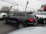 2013 BLACK /Tan Jeep Grand Cherokee Overland 4WD (1C4RJFCT6DC) with an 5.7L V8 OHV 16V engine, 5-Speed Automatic transmission, located at 215 Milton St, Dedham, MA, 02026, (781) 329-5144, 42.241905, -71.157295 - There is not many options this low mile Grand Cherokee does not have. Summit edition, panoramic roof, Leather, Loaded up. In excellent condition for the year, you won't believe it is a 2013. All ASPI Motor Cars vehicles are fully serviced before they are delivered to assure the highest quality used - Photo#4