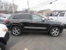 2013 BLACK /Tan Jeep Grand Cherokee Overland 4WD (1C4RJFCT6DC) with an 5.7L V8 OHV 16V engine, 5-Speed Automatic transmission, located at 215 Milton St, Dedham, MA, 02026, (781) 329-5144, 42.241905, -71.157295 - There is not many options this low mile Grand Cherokee does not have. Summit edition, panoramic roof, Leather, Loaded up. In excellent condition for the year, you won't believe it is a 2013. All ASPI Motor Cars vehicles are fully serviced before they are delivered to assure the highest quality used - Photo#7