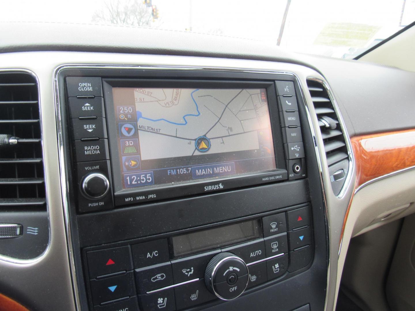 2013 BLACK /Tan Jeep Grand Cherokee Overland 4WD (1C4RJFCT6DC) with an 5.7L V8 OHV 16V engine, 5-Speed Automatic transmission, located at 215 Milton St, Dedham, MA, 02026, (781) 329-5144, 42.241905, -71.157295 - There is not many options this low mile Grand Cherokee does not have. Summit edition, panoramic roof, Leather, Loaded up. In excellent condition for the year, you won't believe it is a 2013. All ASPI Motor Cars vehicles are fully serviced before they are delivered to assure the highest quality used - Photo#21