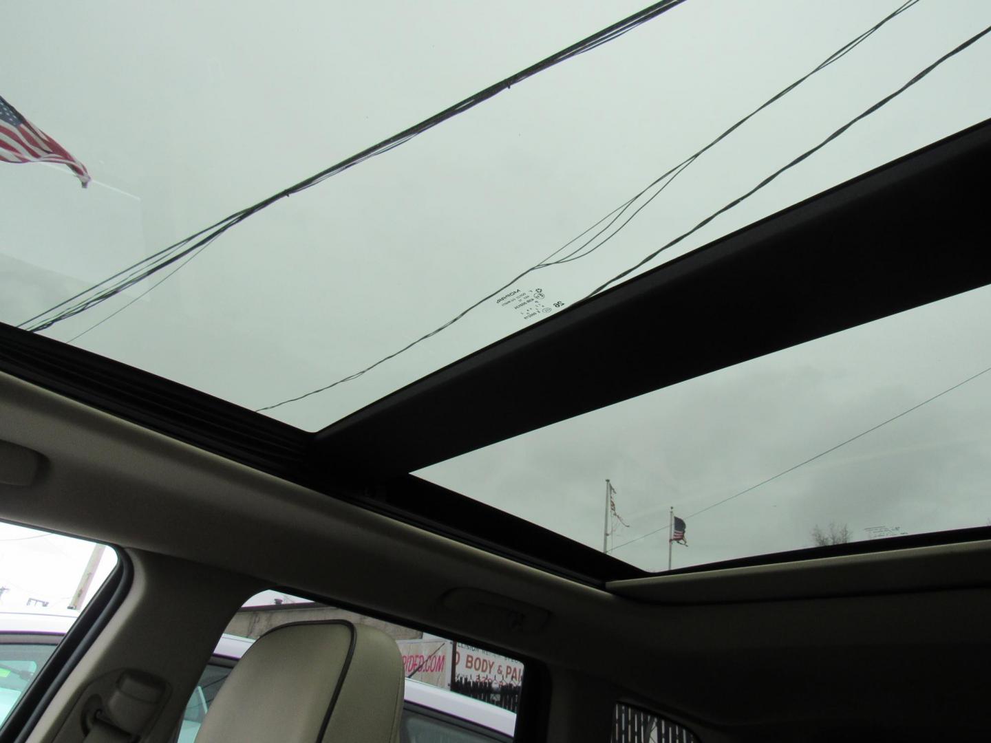 2013 BLACK /Tan Jeep Grand Cherokee Overland 4WD (1C4RJFCT6DC) with an 5.7L V8 OHV 16V engine, 5-Speed Automatic transmission, located at 215 Milton St, Dedham, MA, 02026, (781) 329-5144, 42.241905, -71.157295 - There is not many options this low mile Grand Cherokee does not have. Summit edition, panoramic roof, Leather, Loaded up. In excellent condition for the year, you won't believe it is a 2013. All ASPI Motor Cars vehicles are fully serviced before they are delivered to assure the highest quality used - Photo#22