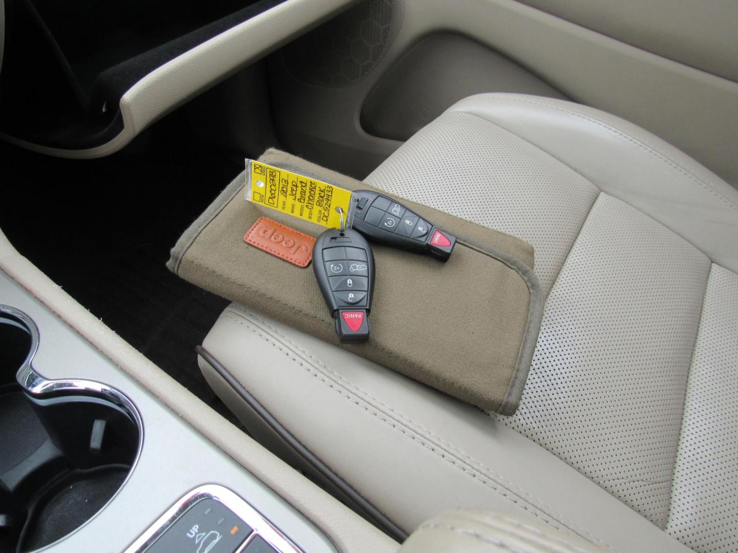 2013 BLACK /Tan Jeep Grand Cherokee Overland 4WD (1C4RJFCT6DC) with an 5.7L V8 OHV 16V engine, 5-Speed Automatic transmission, located at 215 Milton St, Dedham, MA, 02026, (781) 329-5144, 42.241905, -71.157295 - There is not many options this low mile Grand Cherokee does not have. Summit edition, panoramic roof, Leather, Loaded up. In excellent condition for the year, you won't believe it is a 2013. All ASPI Motor Cars vehicles are fully serviced before they are delivered to assure the highest quality used - Photo#23