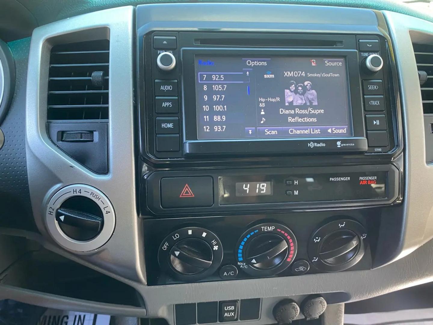 2014 Silver /Grey Toyota Tacoma Access Cab I4 5MT 4WD (5TFUX4EN1EX) with an 2.7L L4 DOHC 16V engine, Automatic transmission, located at 215 Milton St, Dedham, MA, 02026, (781) 329-5144, 42.241905, -71.157295 - Meet the silver 2014 Toyota Tacoma—a hardworking used truck that’s ready for weekday duty and weekend dirt. With a 2.7L 4-cylinder gasoline engine and an automatic transmission, it keeps things simple, dependable, and easy to drive, while its 4WD drivetrain is there when the pavement ends and th - Photo#13