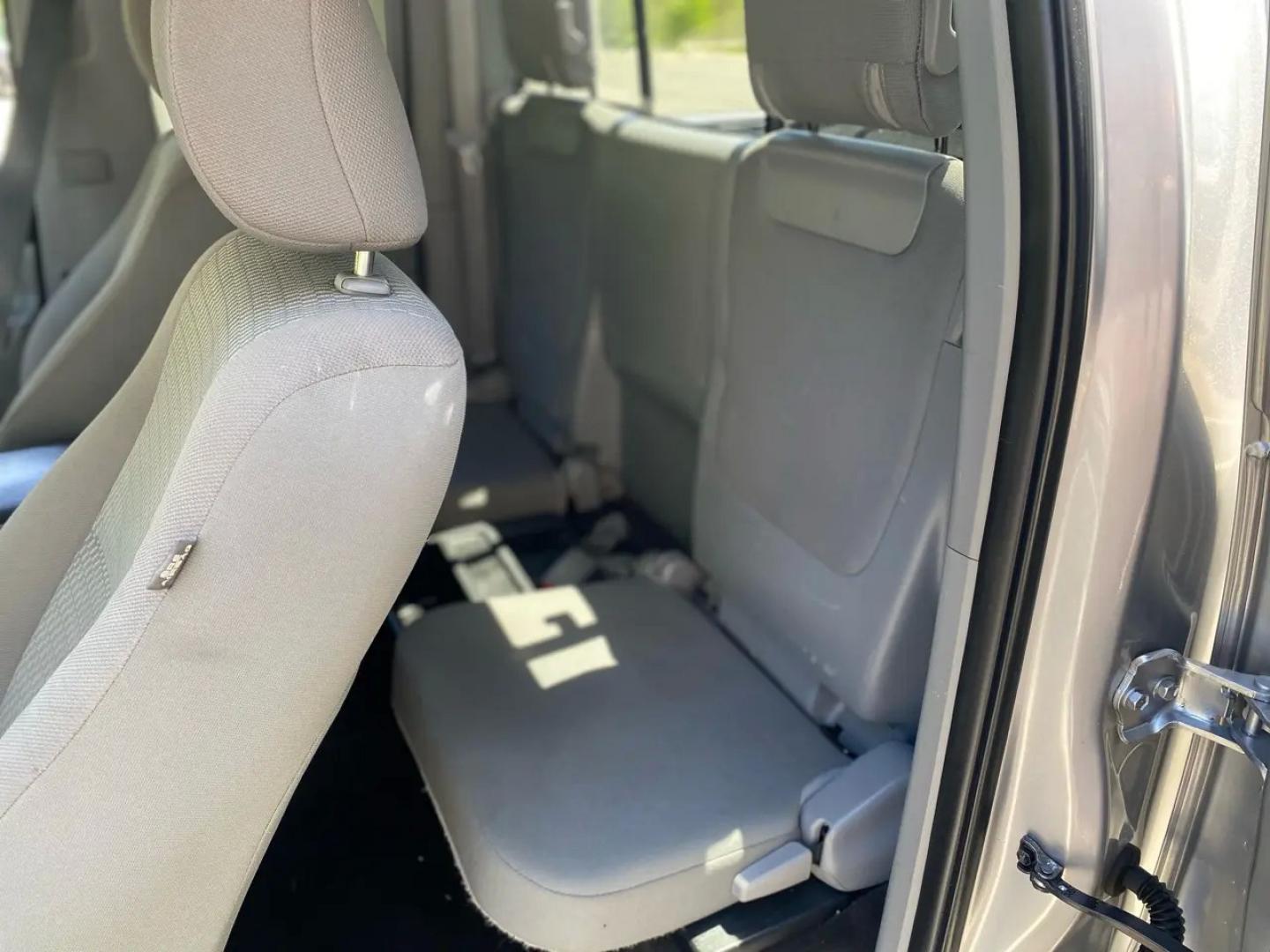 2014 Silver /Grey Toyota Tacoma Access Cab I4 5MT 4WD (5TFUX4EN1EX) with an 2.7L L4 DOHC 16V engine, Automatic transmission, located at 215 Milton St, Dedham, MA, 02026, (781) 329-5144, 42.241905, -71.157295 - Meet the silver 2014 Toyota Tacoma—a hardworking used truck that’s ready for weekday duty and weekend dirt. With a 2.7L 4-cylinder gasoline engine and an automatic transmission, it keeps things simple, dependable, and easy to drive, while its 4WD drivetrain is there when the pavement ends and th - Photo#16