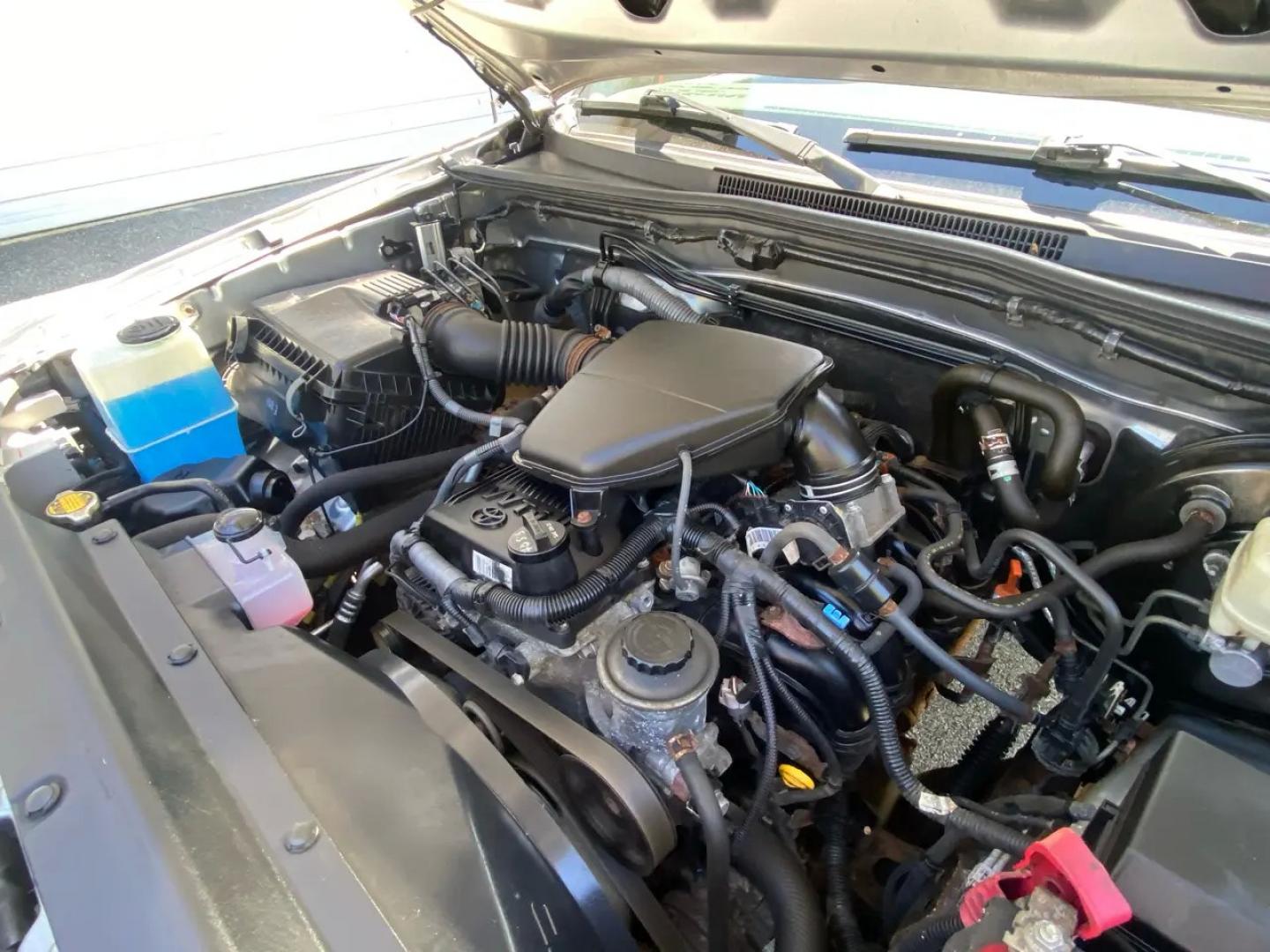2014 Silver /Grey Toyota Tacoma Access Cab I4 5MT 4WD (5TFUX4EN1EX) with an 2.7L L4 DOHC 16V engine, Automatic transmission, located at 215 Milton St, Dedham, MA, 02026, (781) 329-5144, 42.241905, -71.157295 - Meet the silver 2014 Toyota Tacoma—a hardworking used truck that’s ready for weekday duty and weekend dirt. With a 2.7L 4-cylinder gasoline engine and an automatic transmission, it keeps things simple, dependable, and easy to drive, while its 4WD drivetrain is there when the pavement ends and th - Photo#17